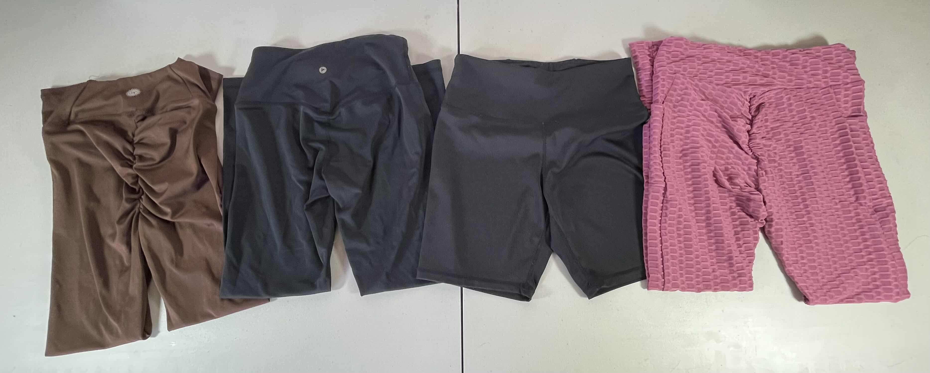 Photo 1 of WOMENS LEGGINGS (3) AND WORKOUT SHORTS SIZE SMALL