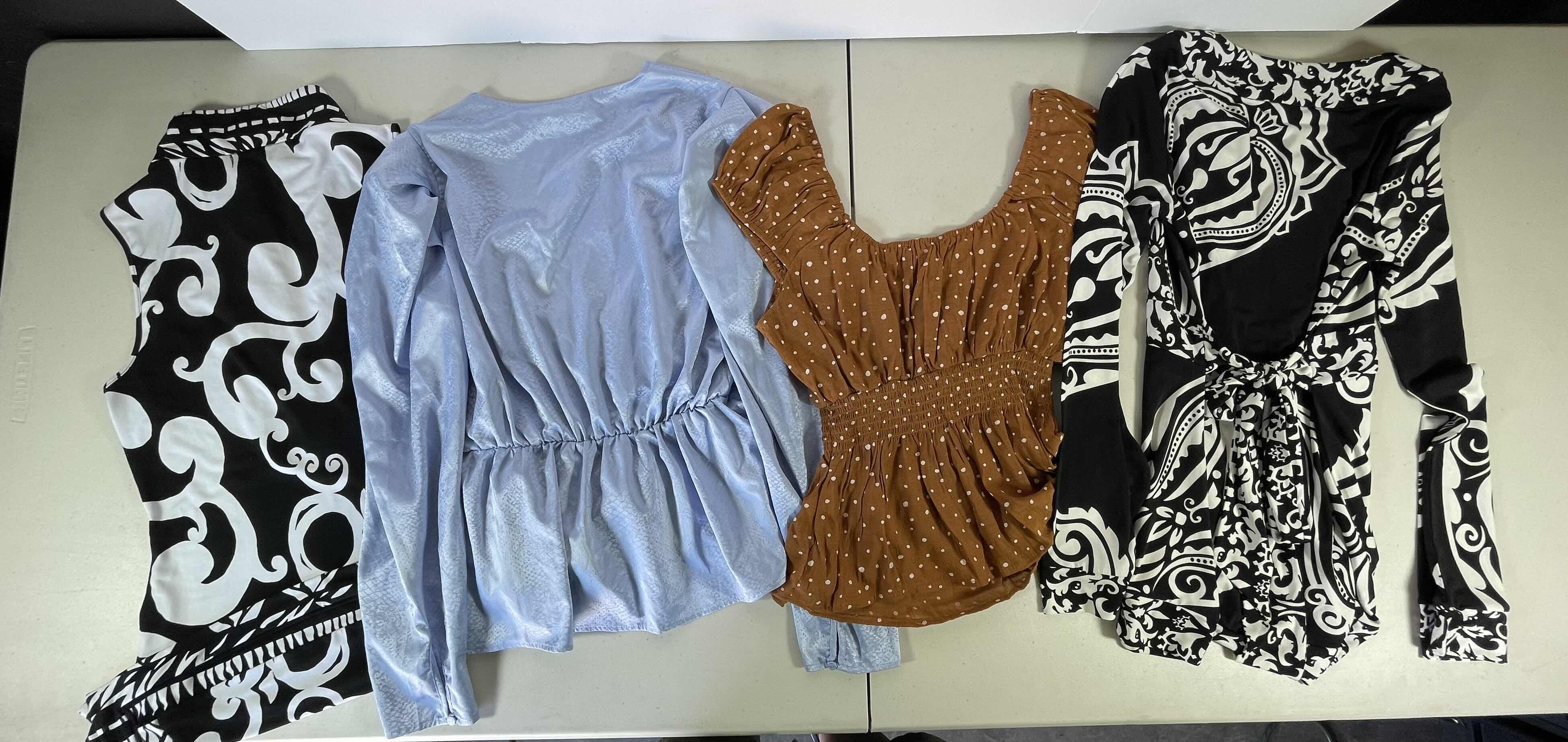 Photo 6 of WOMENS ASSORTED TOPS (4)