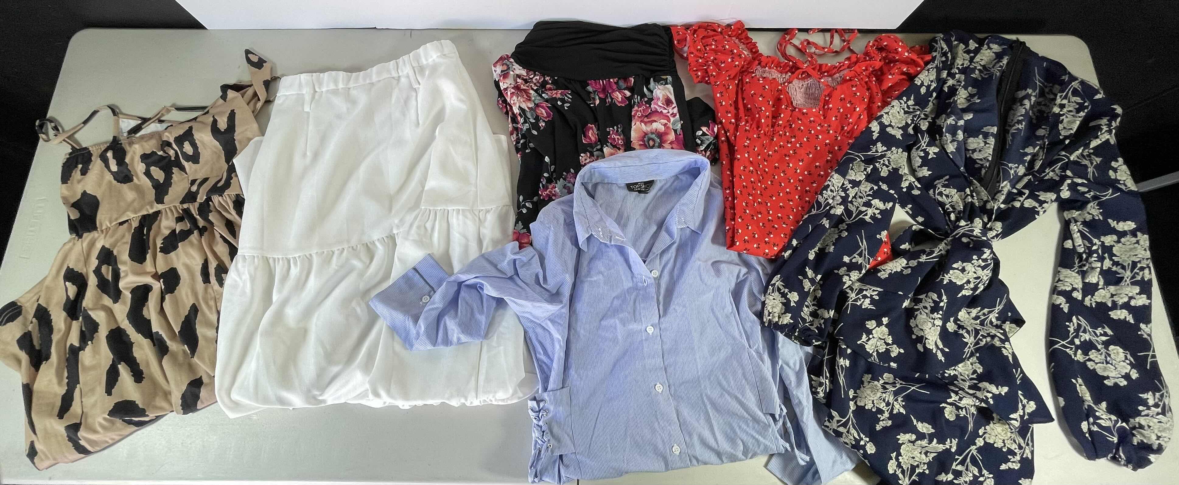 Photo 1 of WOMENS ASSORTED SKIRTS, DRESES & TOPS (6 PIECE LOT)