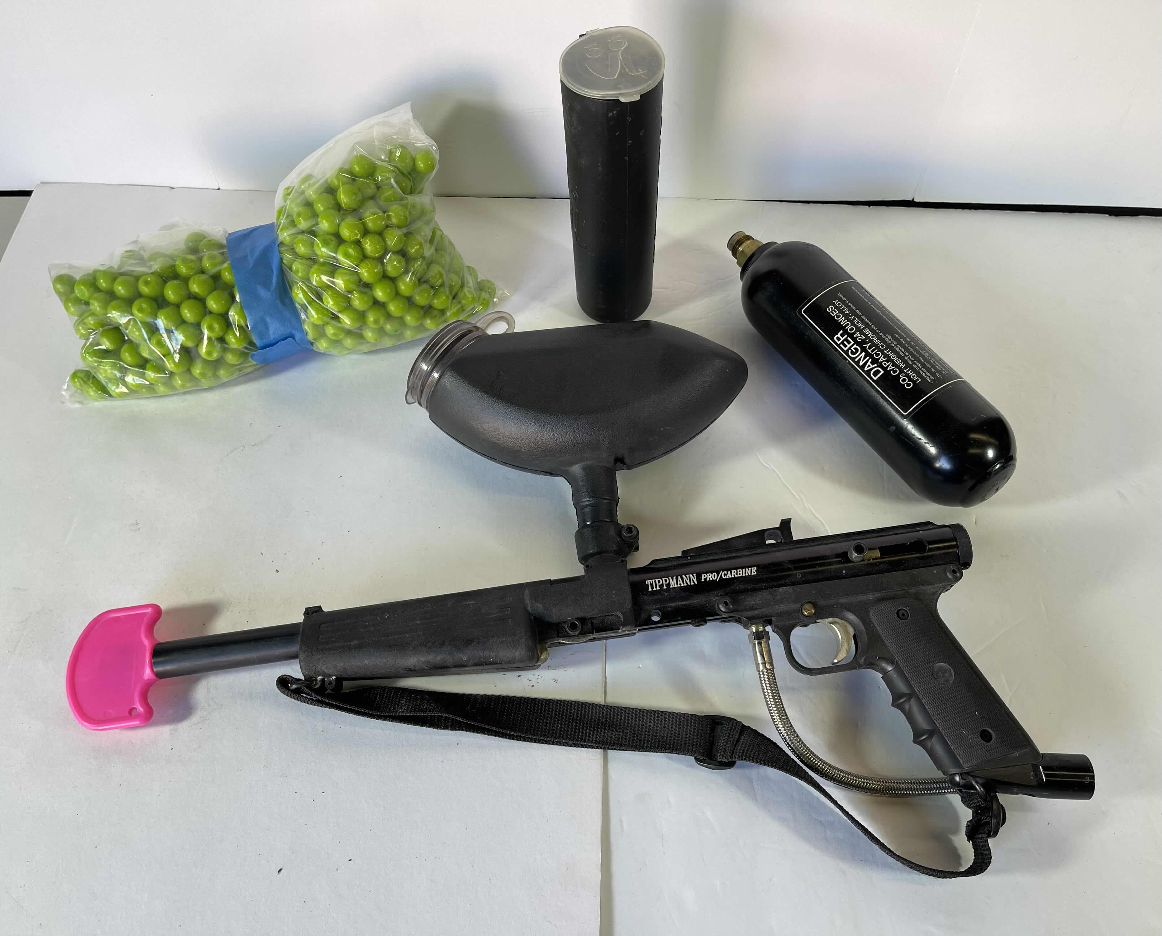 Photo 1 of TIPPMANN PRO/CARBINE AIR PAINT BALL GUN WITH ACCESSORIES AND 250 PAINTBALLS