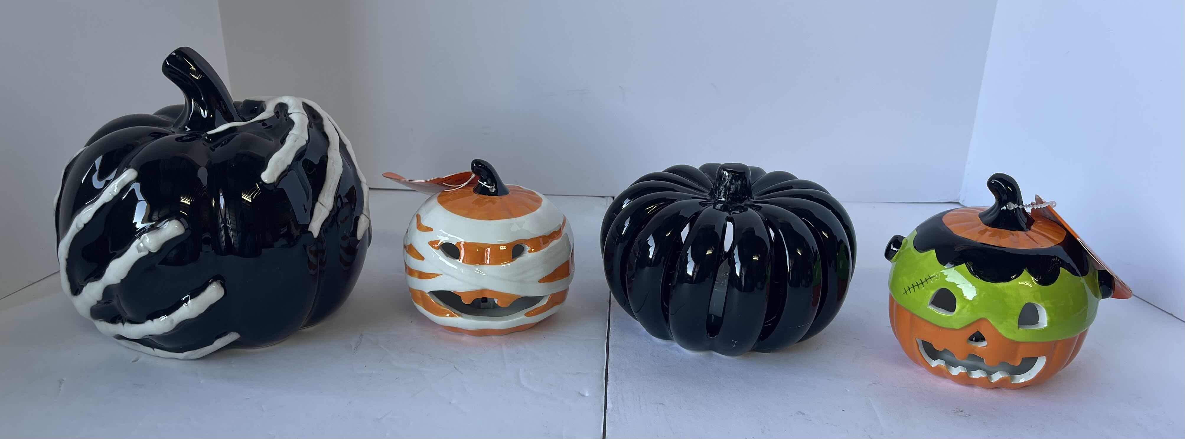 Photo 1 of CERAMIC HALLOWEEN PUMPKINS (4) NEW