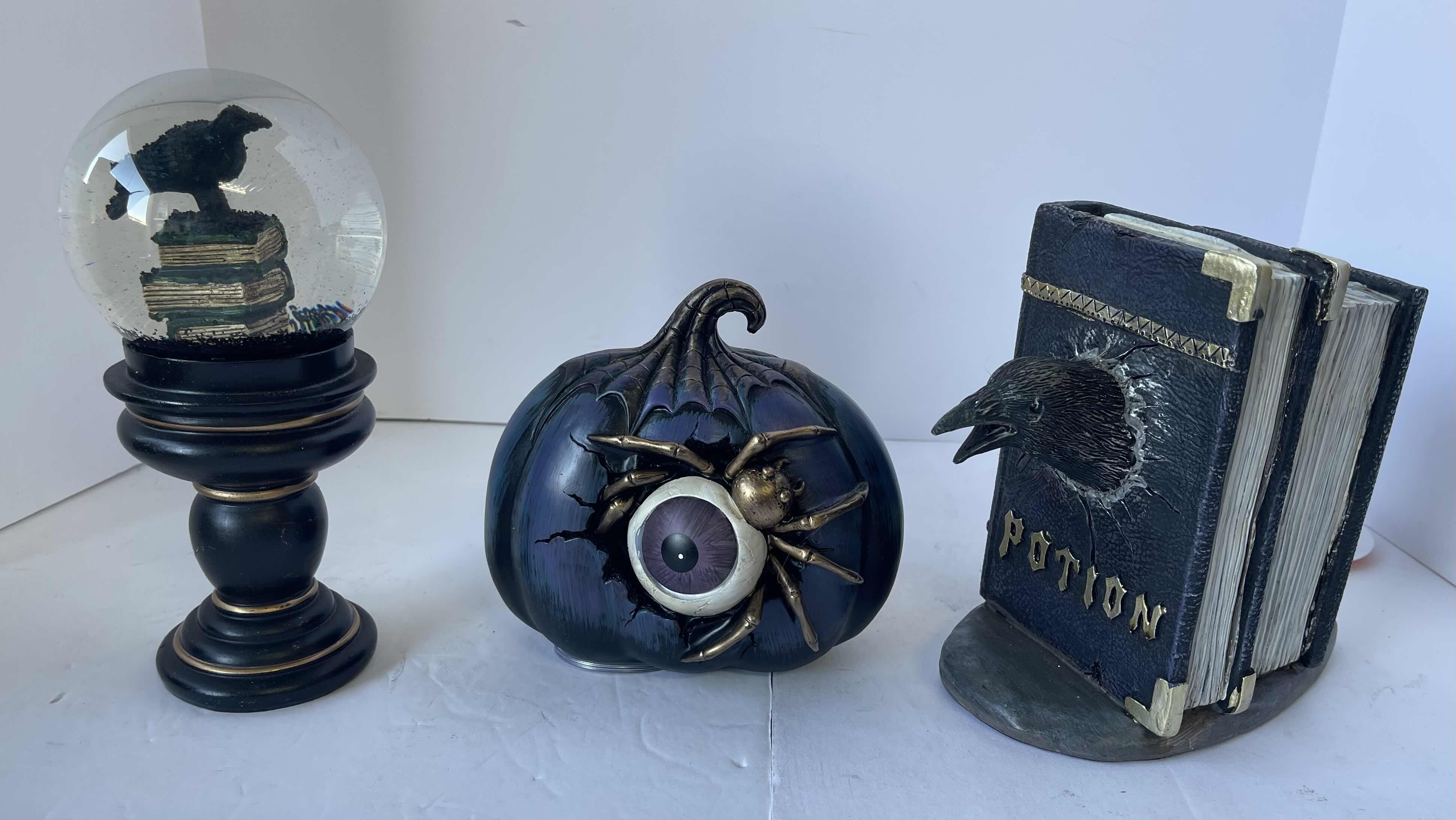 Photo 1 of HALLOWEEN TABLE TOP RESIN LIGHT UP HOME DECOR ITEMS (2) & RAVEN WATER GLOBE NEW