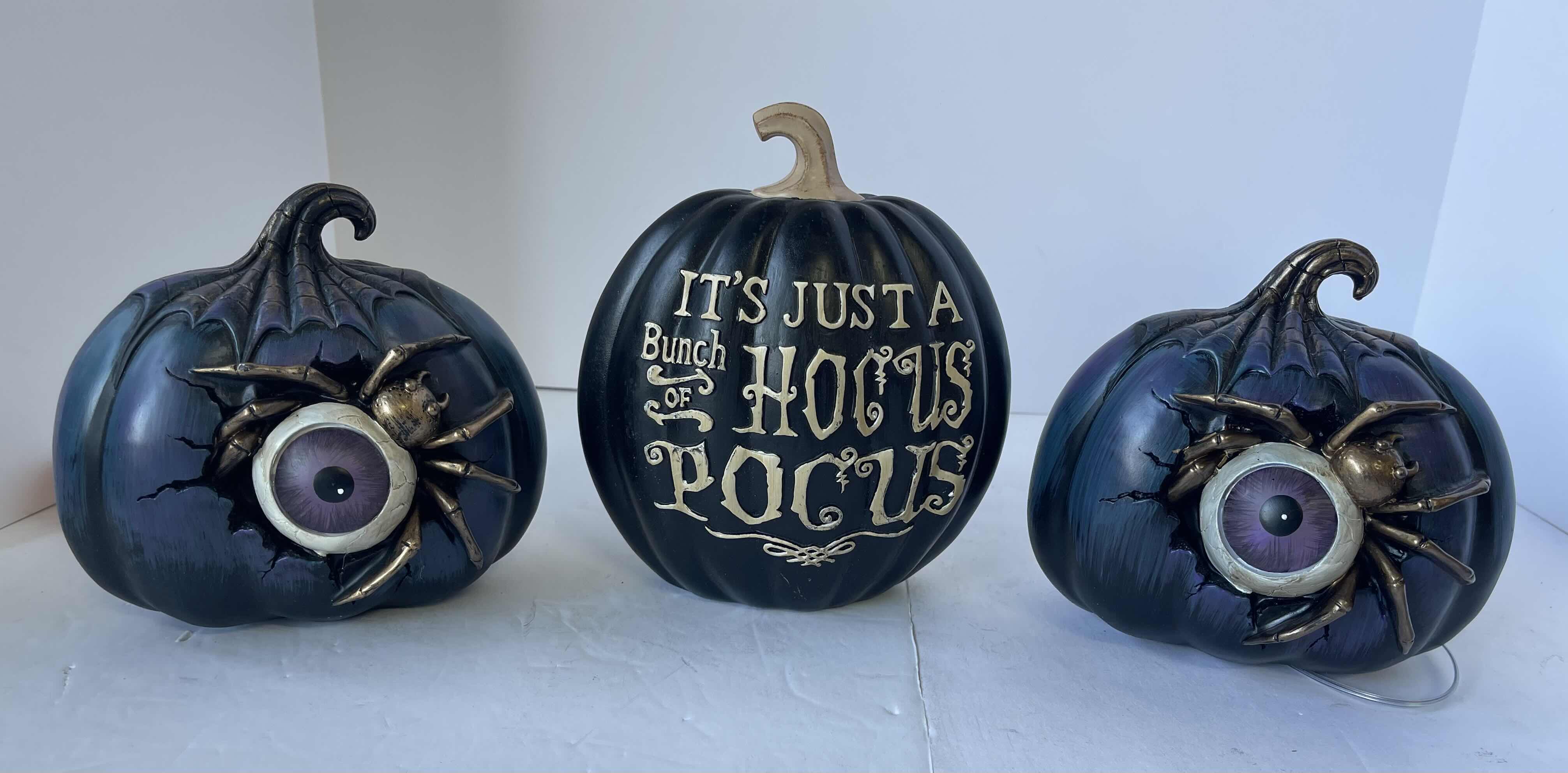 Photo 1 of RESIN HALLOWEEN PUMPKINS - LIGHT UP SPIDER EYEBALL (2) & HOCUS POCUS NEW