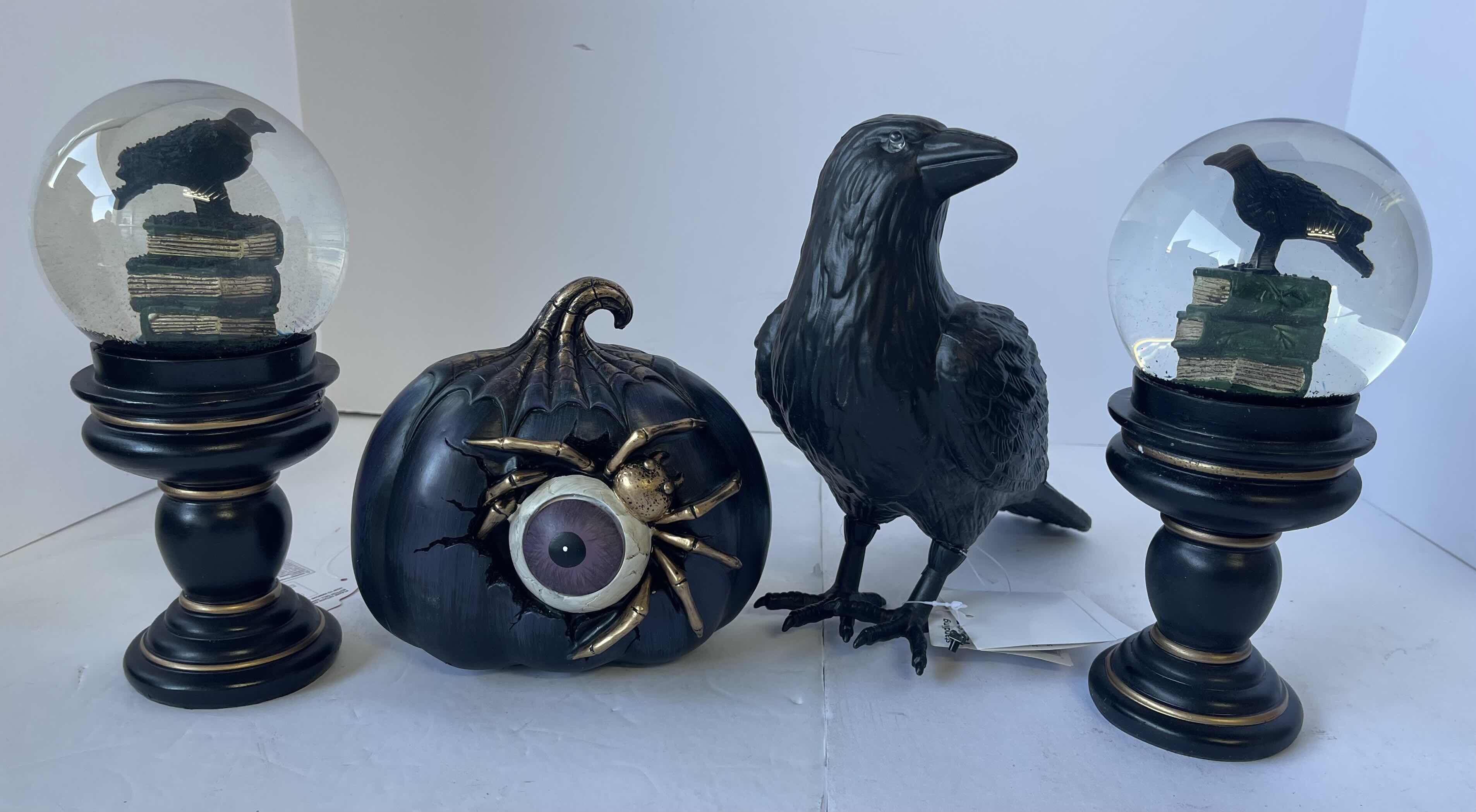 Photo 1 of HALLOWEEN TABLE
TOP DECOR - LIGHT UP SPIDER PUMPKIN, RAVEN WATER GLOBES (2) & PLASTIC RAVEN