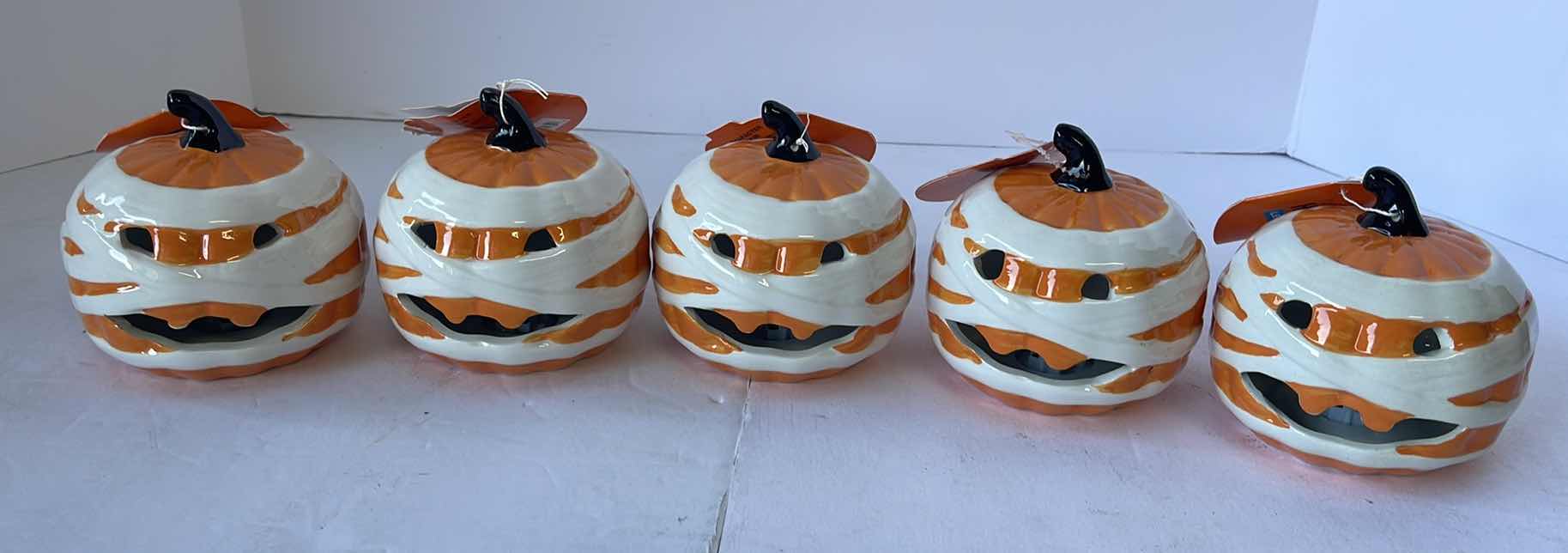 Photo 1 of HAPPY HALLOWEEN 4” MINI CERAMIC LIGHT UP PUMPKINS (5)