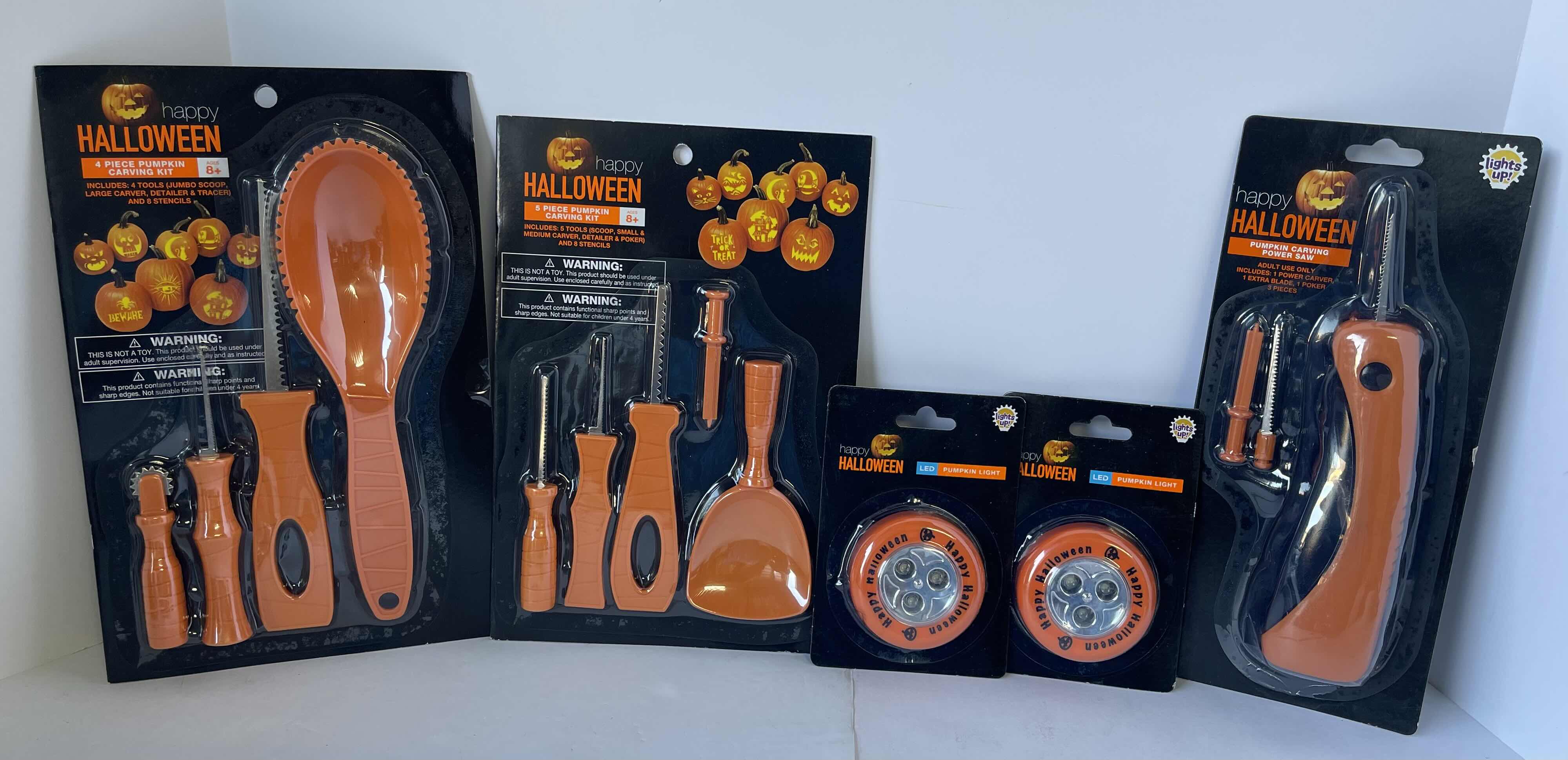 Photo 1 of PUMPKIN CARVING KITS (3), POWER CARVING SAW & LED PUMPKIN LIGHT (2)