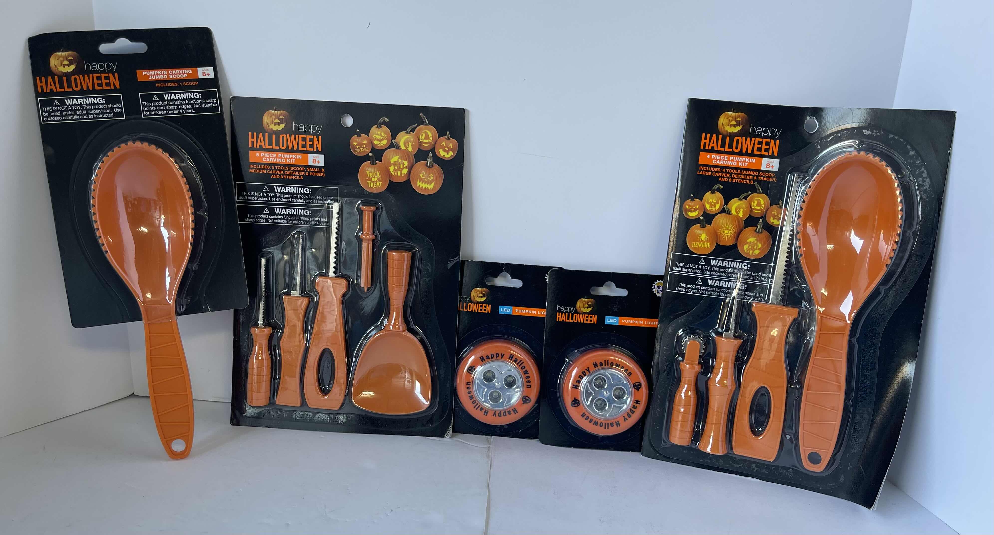 Photo 1 of PUMPKIN CARVING KITS (2), JUMBO CARVING SPOON & LED PUMPKIN LIGHT (2)