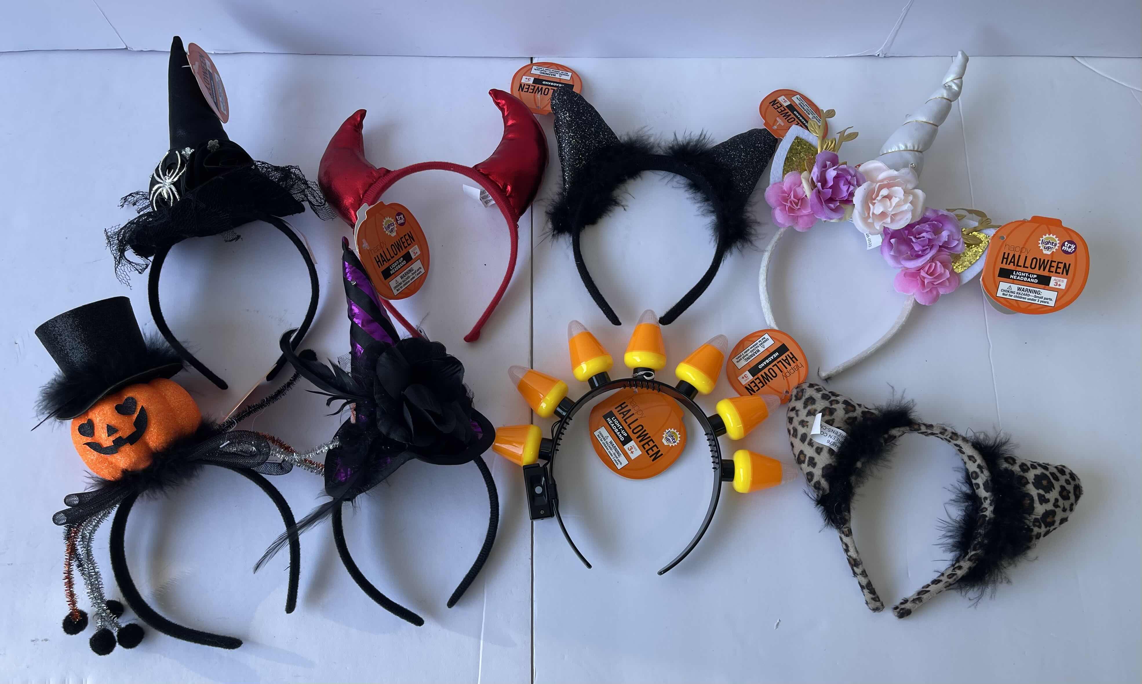 Photo 1 of HALLOWEEN LIGHT-UP AND NON LIGHT-UP HEADBAND ASSORTMENT (8)