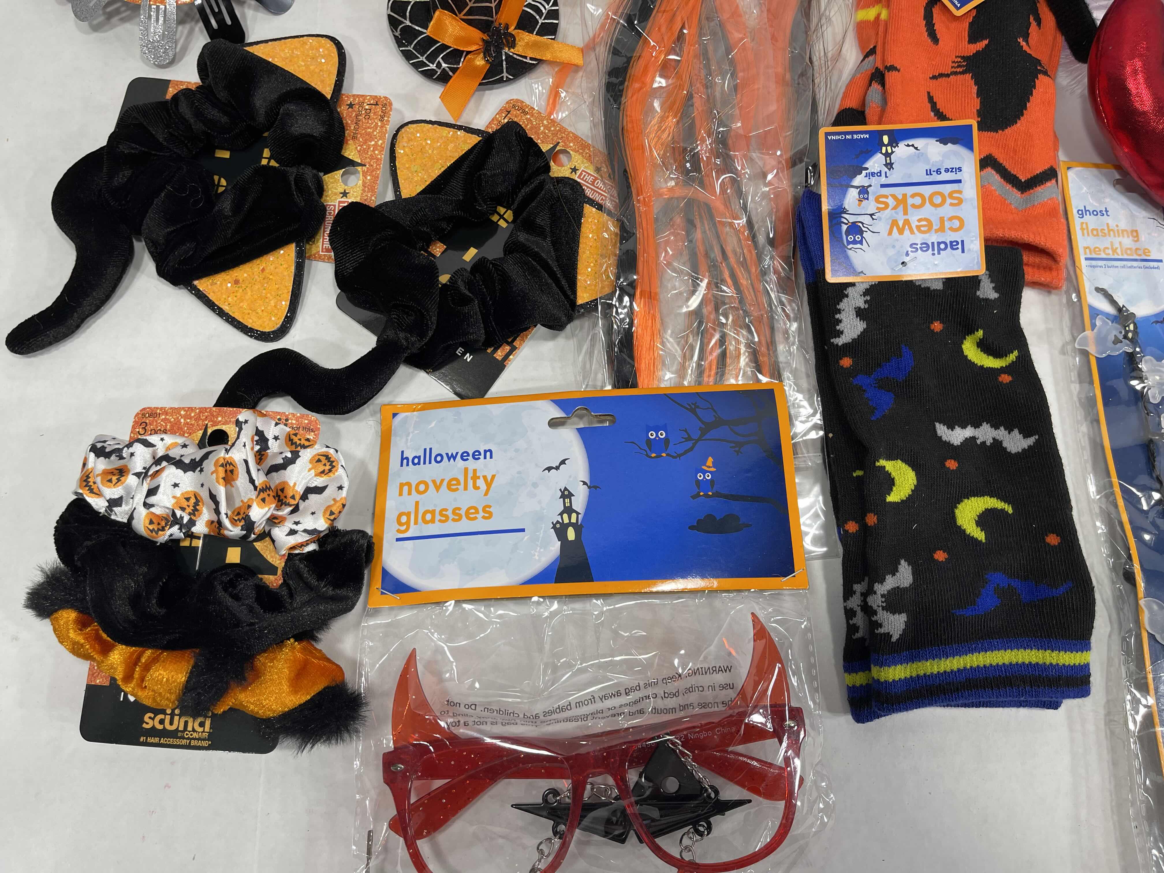 Photo 2 of FUN LADIES HALLOWEEN ACCESSORIES LOT - HEAD WEARS, HEAD BANDS, SOCKS, NECKLACE & GLASSES MSRP $40