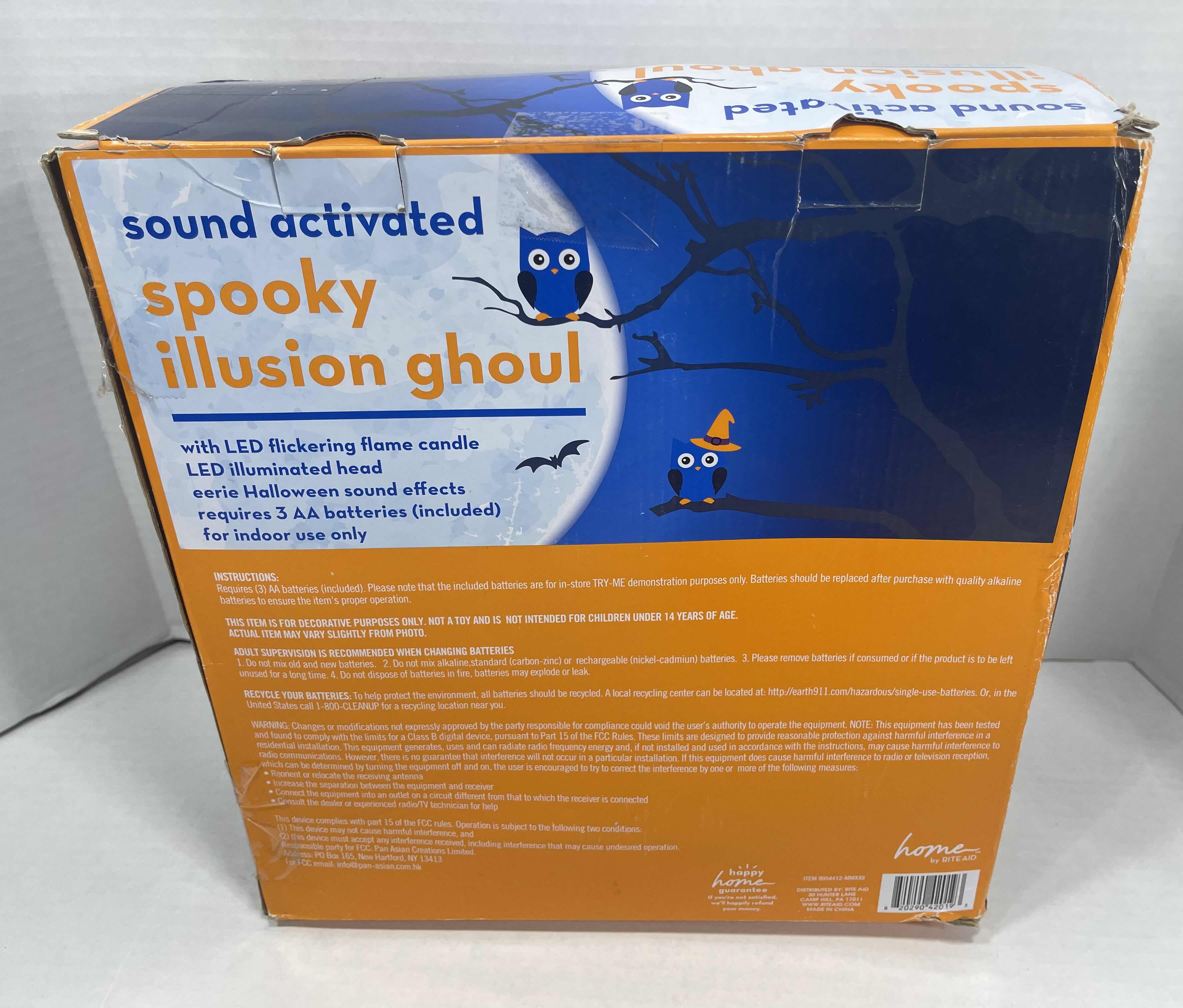 Photo 2 of SPOOKY ILLUSION GHOUL H42” SOUND ACTIVATED WITH LED FLICKERING FLAME CANDLE MSRP $70