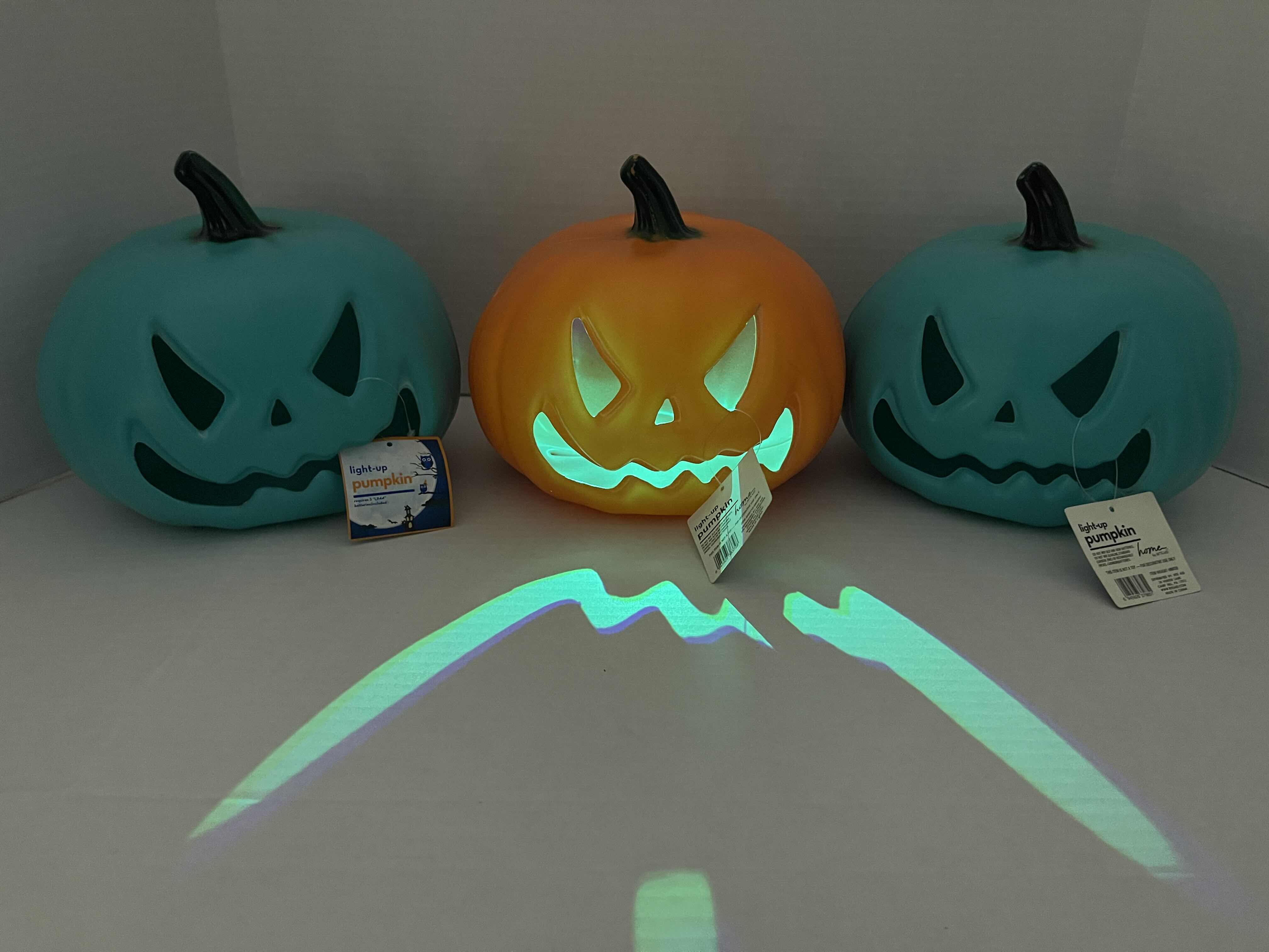 Photo 6 of LIGHT-UP LED 7” PUMPKINS (3) - TURQUOISE/GREEN (2) & ORANGE (1) MSRP $75