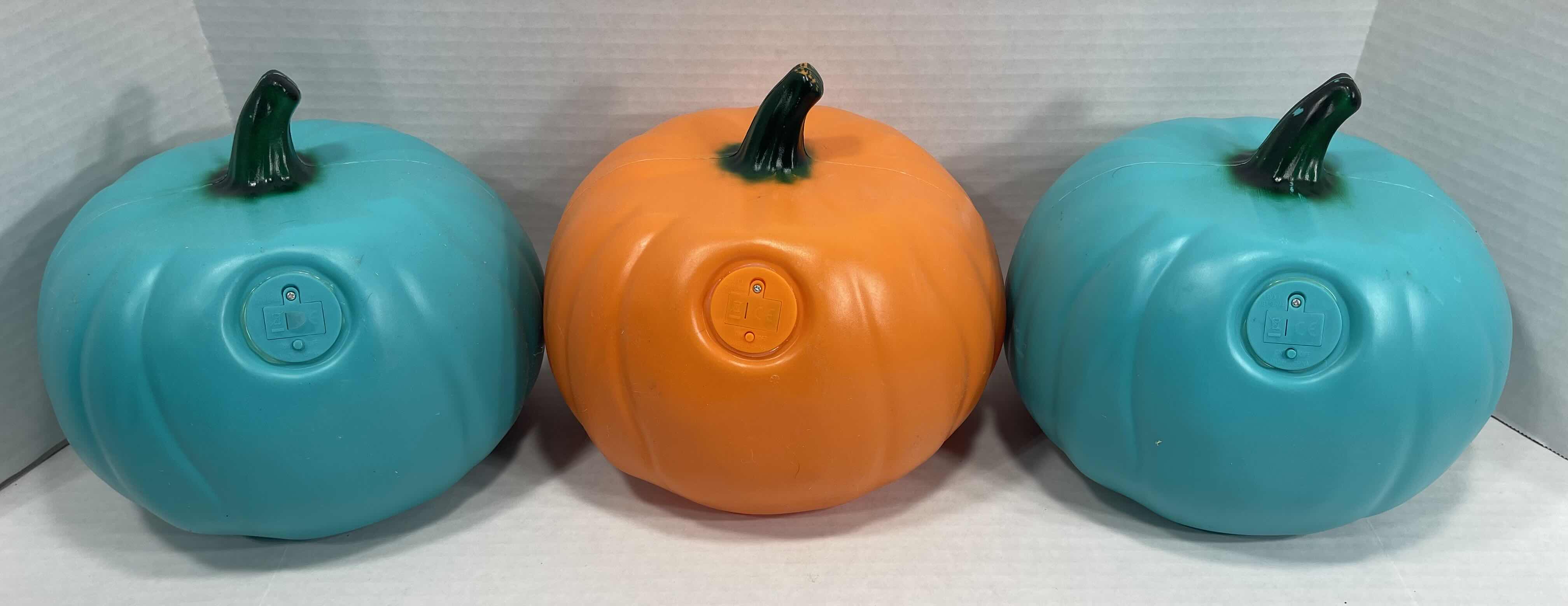 Photo 5 of LIGHT-UP LED 7” PUMPKINS (3) - TURQUOISE/GREEN (2) & ORANGE (1) MSRP $75