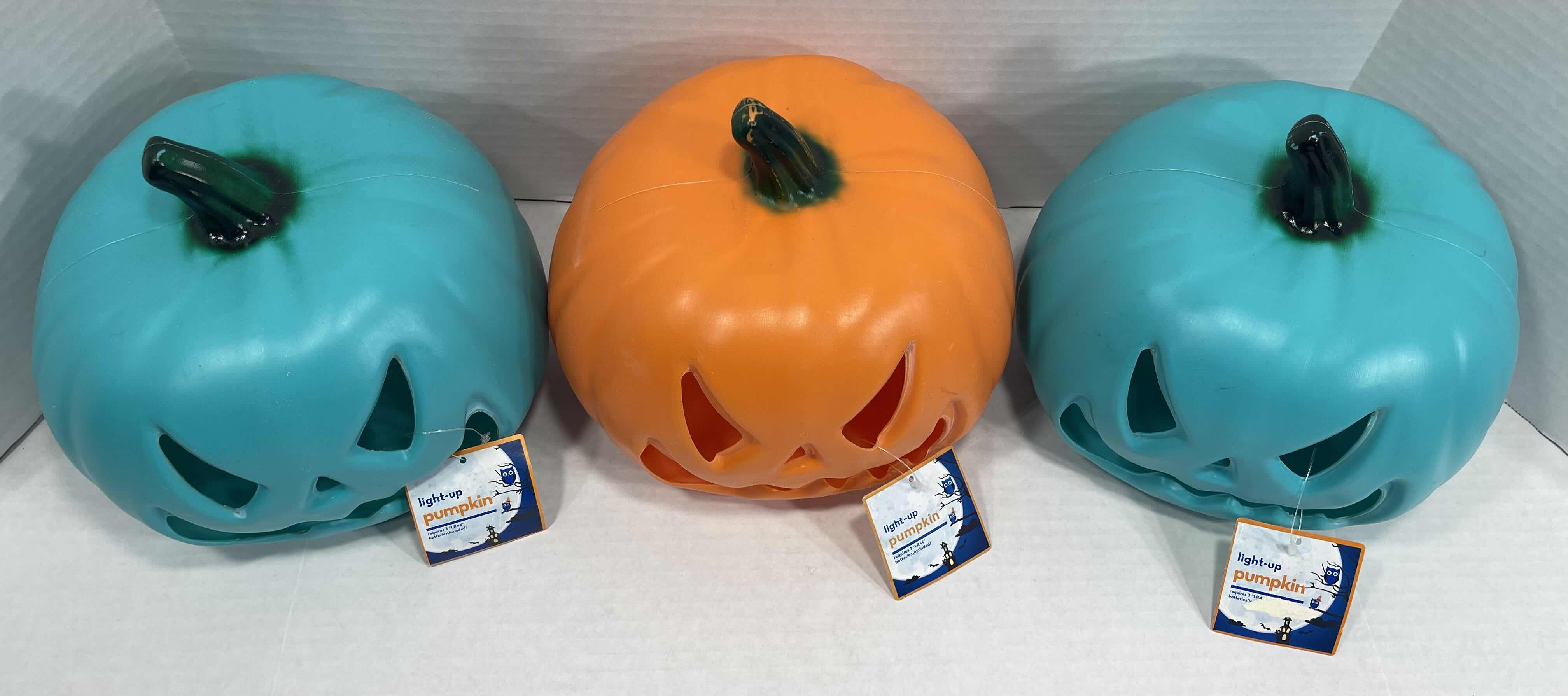 Photo 4 of LIGHT-UP LED 7” PUMPKINS (3) - TURQUOISE/GREEN (2) & ORANGE (1) MSRP $75