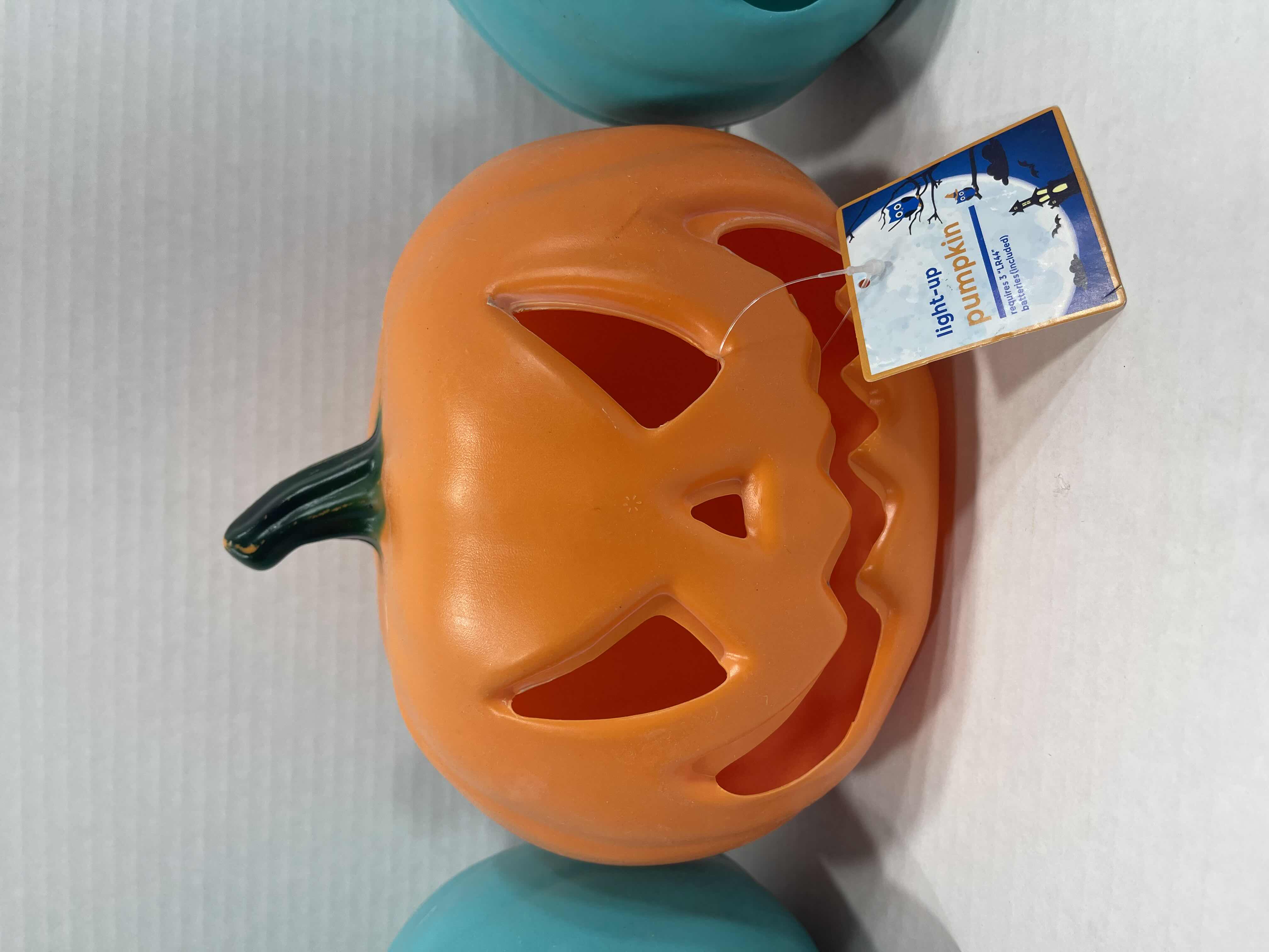 Photo 2 of LIGHT-UP LED 7” PUMPKINS (3) - TURQUOISE/GREEN (2) & ORANGE (1) MSRP $75