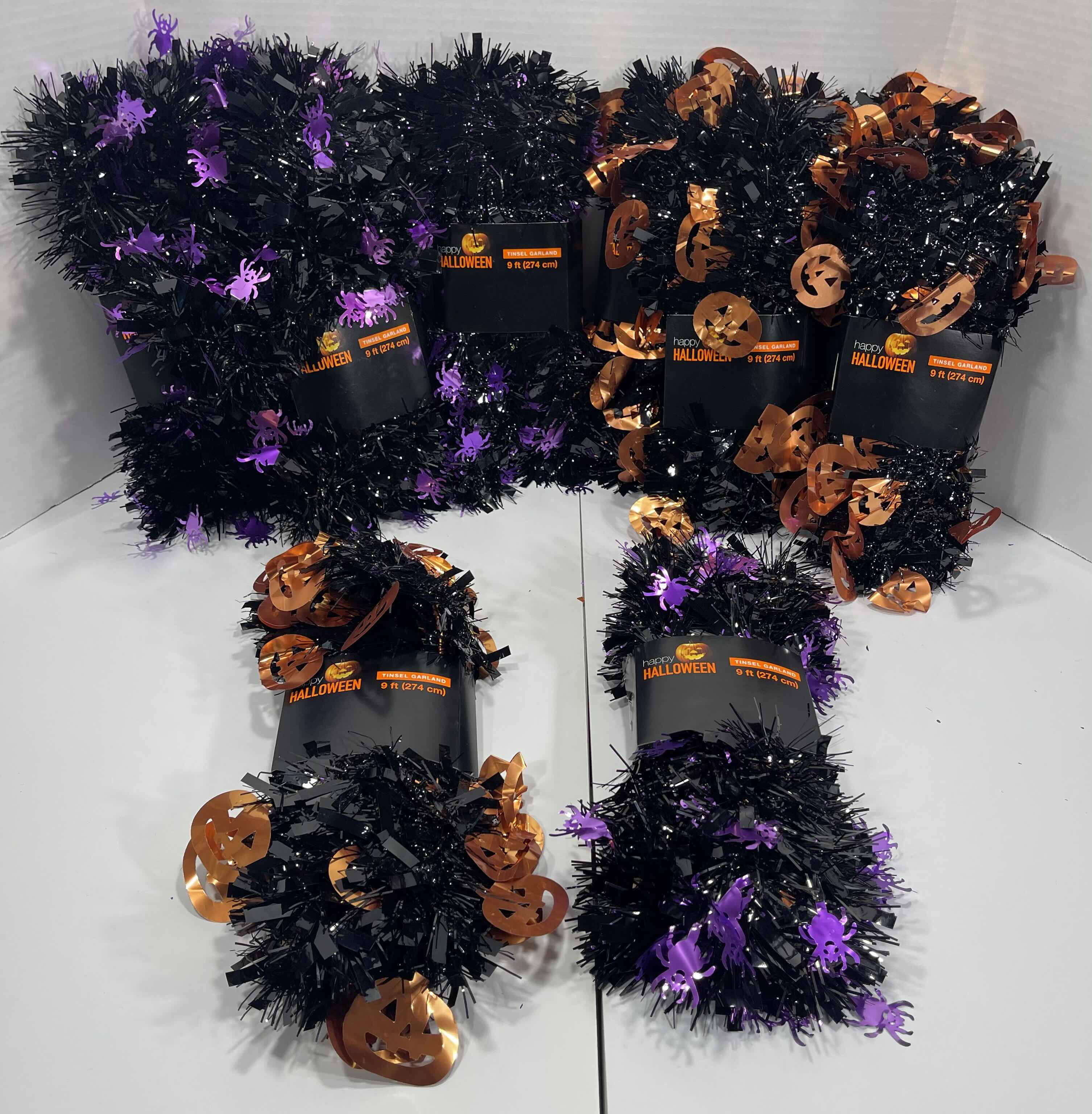 Photo 1 of HALLOWEEN TINSEL GARLAND - BLACK WITH PURPLE SPIDERS 9’ (5) & BLACK WITH ORANGE PUMPKINS 9’ (5) MSRP $80