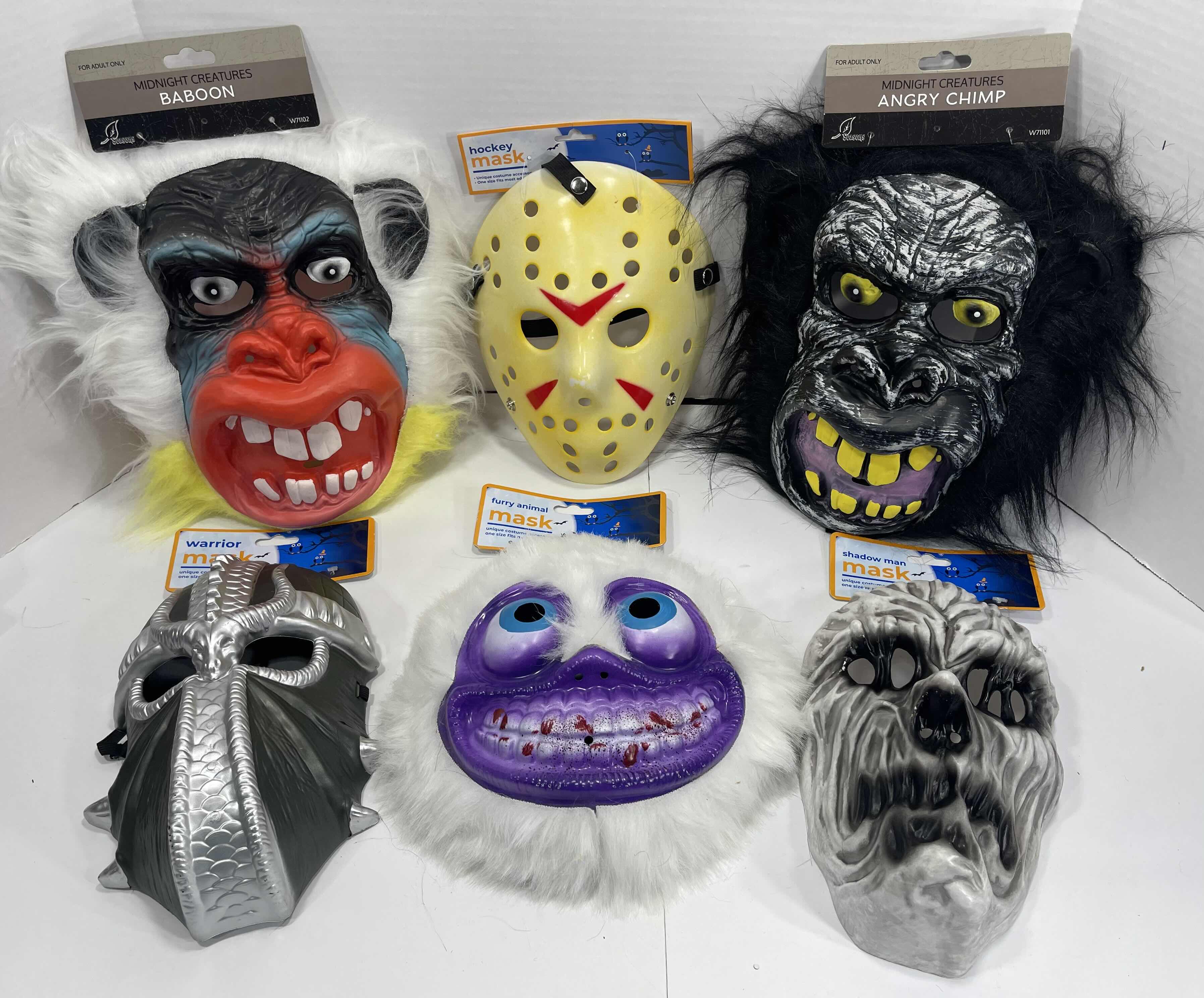 Photo 1 of ADULT ONE SIZE FITS MOST HALLOWEEN PLASTIC MASKS (6) TALLEST MEASURES 11” MSRP $60