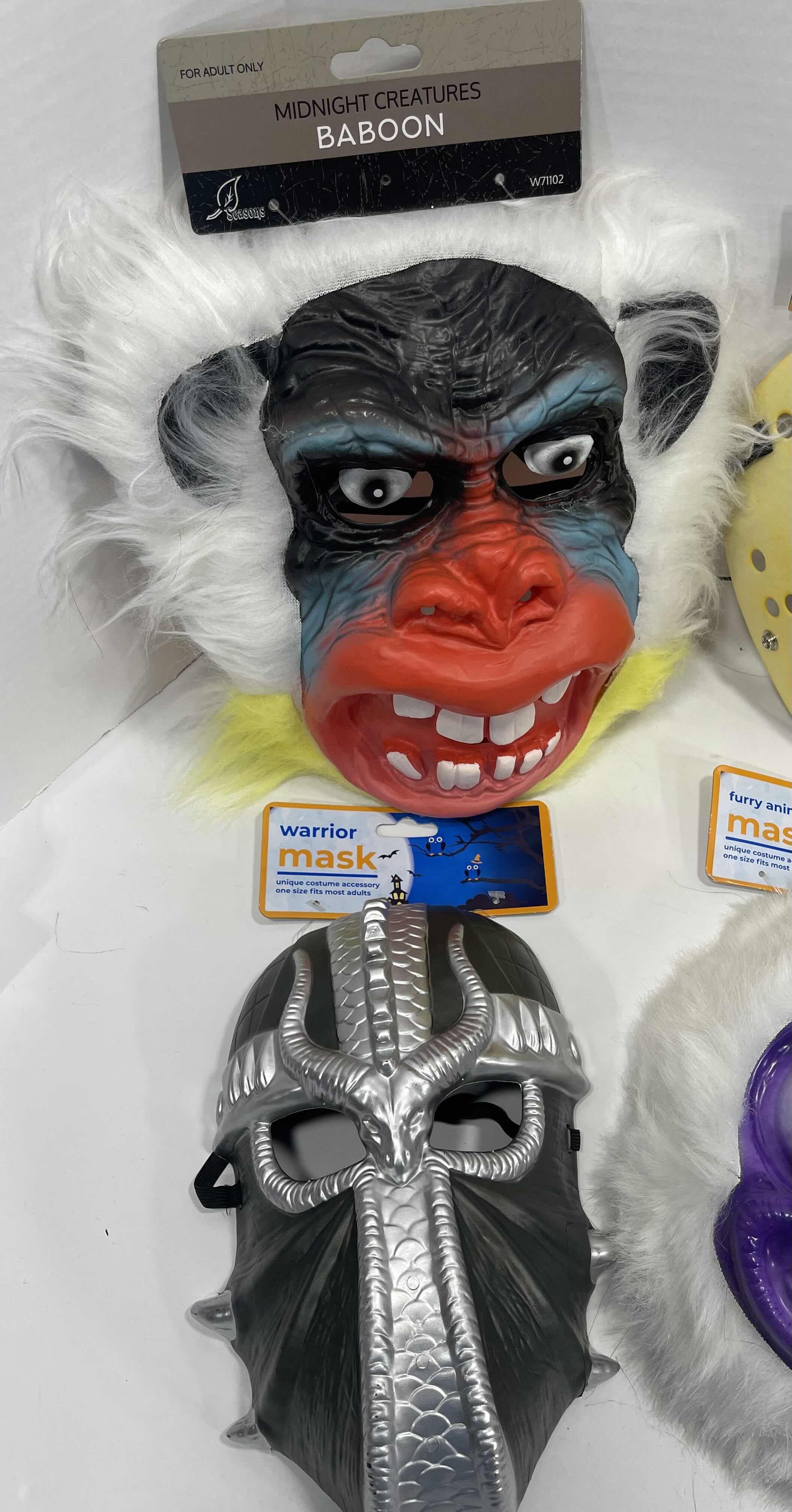 Photo 2 of ADULT ONE SIZE FITS MOST HALLOWEEN PLASTIC MASKS (6) TALLEST MEASURES 11” MSRP $60