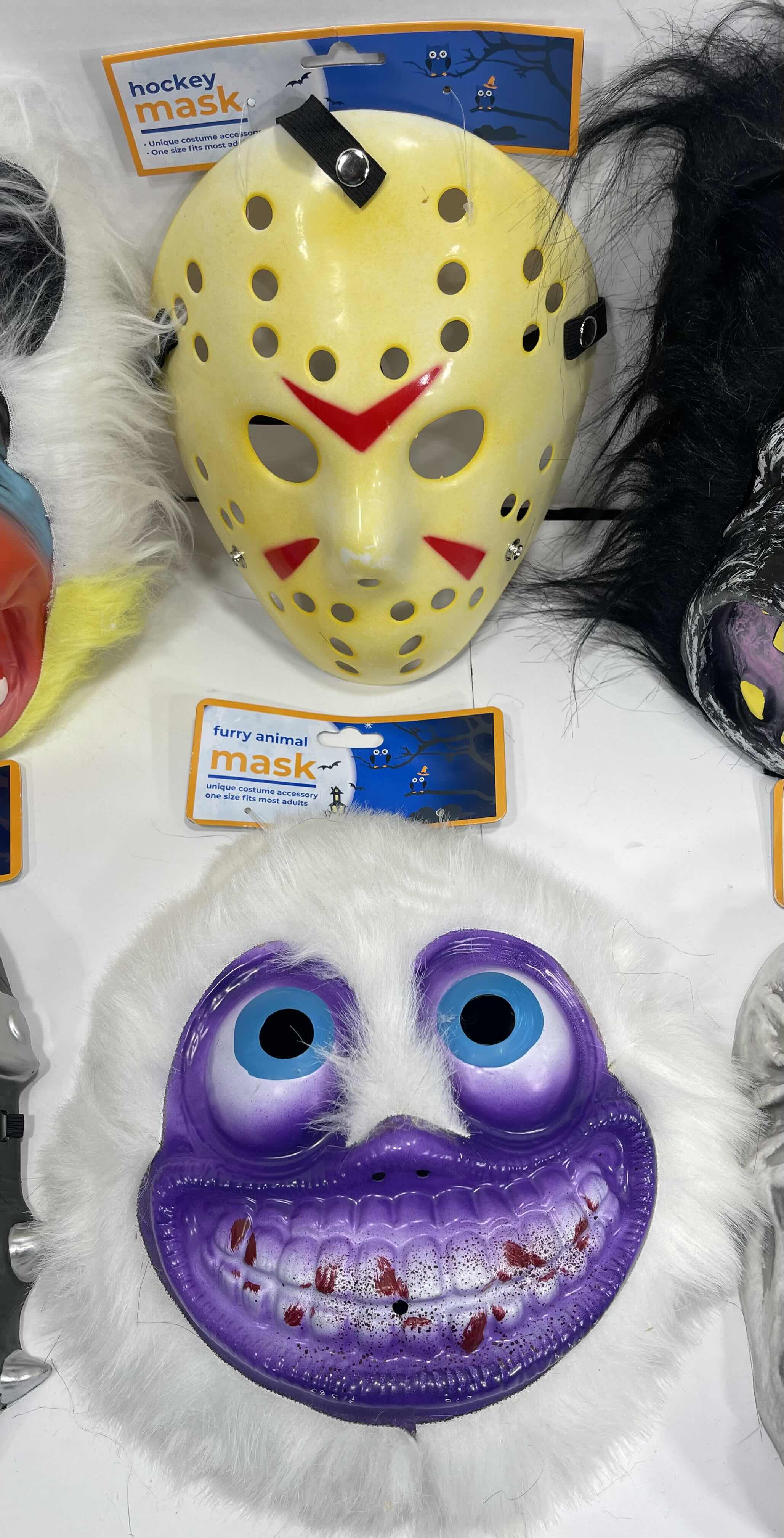 Photo 3 of ADULT ONE SIZE FITS MOST HALLOWEEN PLASTIC MASKS (6) TALLEST MEASURES 11” MSRP $60