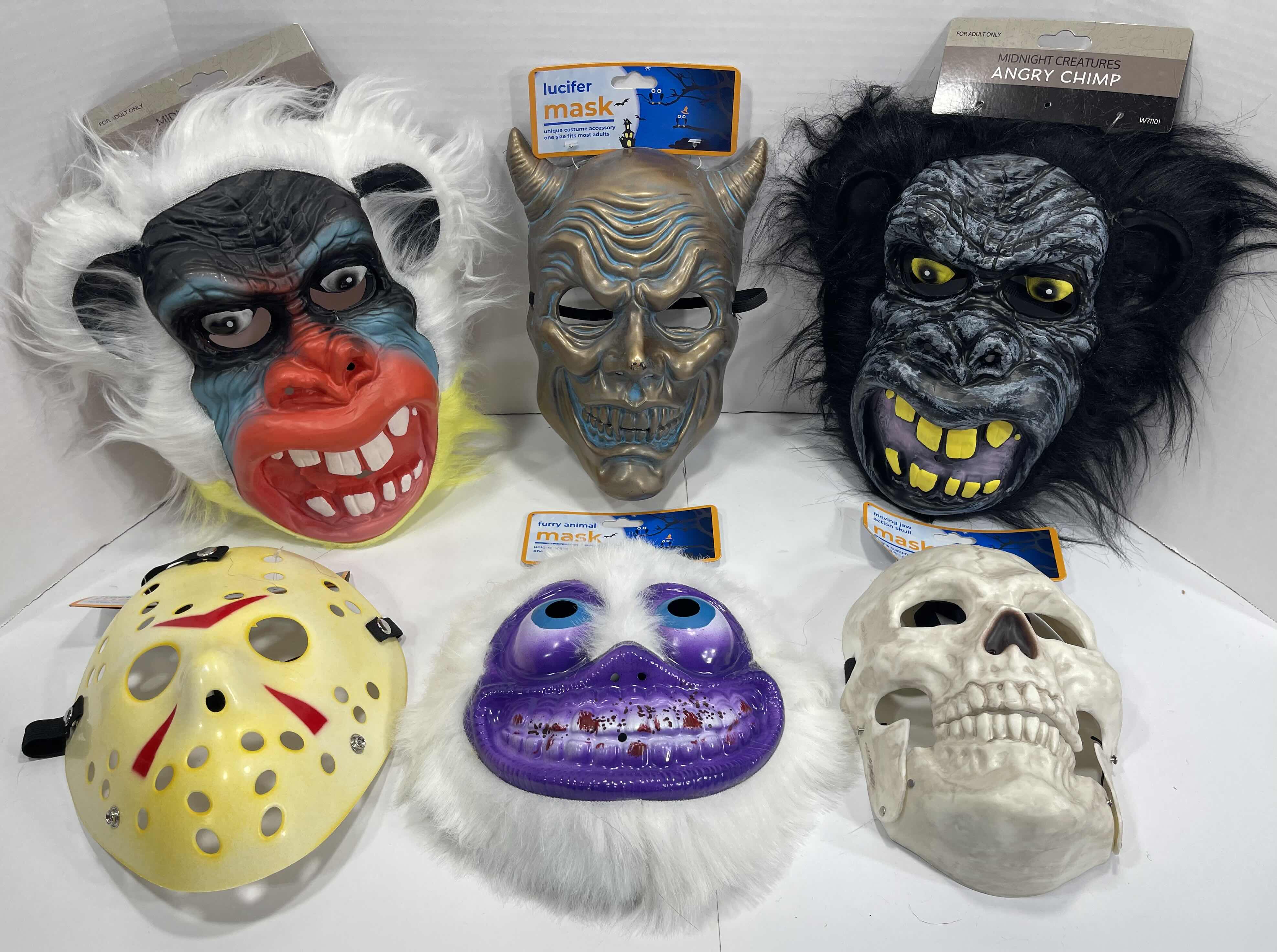 Photo 1 of ADULT ONE SIZE FITS MOST HALLOWEEN PLASTIC MASKS (6) TALLEST MEASURES 11” MSRP $60