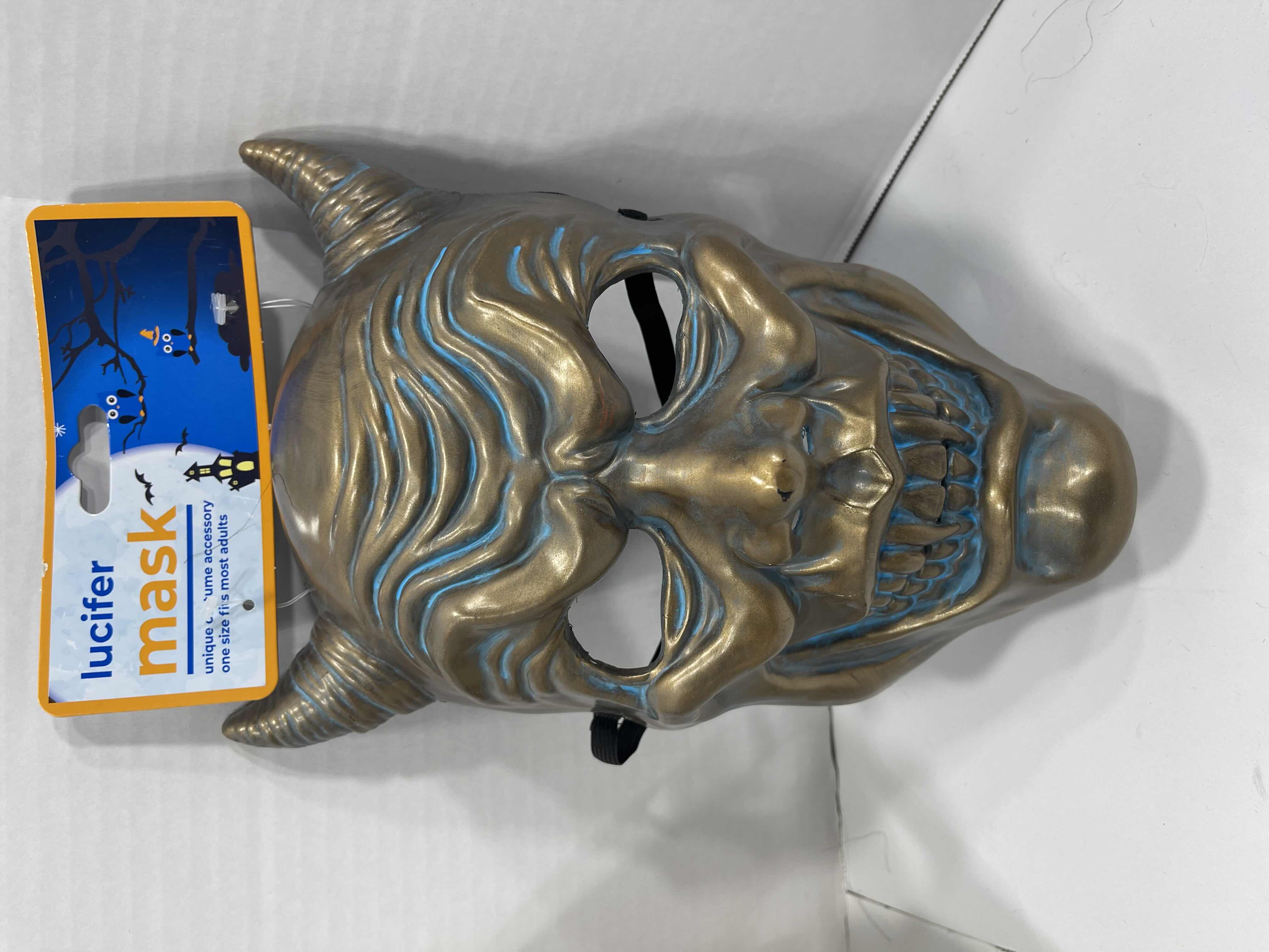 Photo 4 of ADULT ONE SIZE FITS MOST HALLOWEEN PLASTIC MASKS (3) TALLEST MEASURES 11” MSRP $30