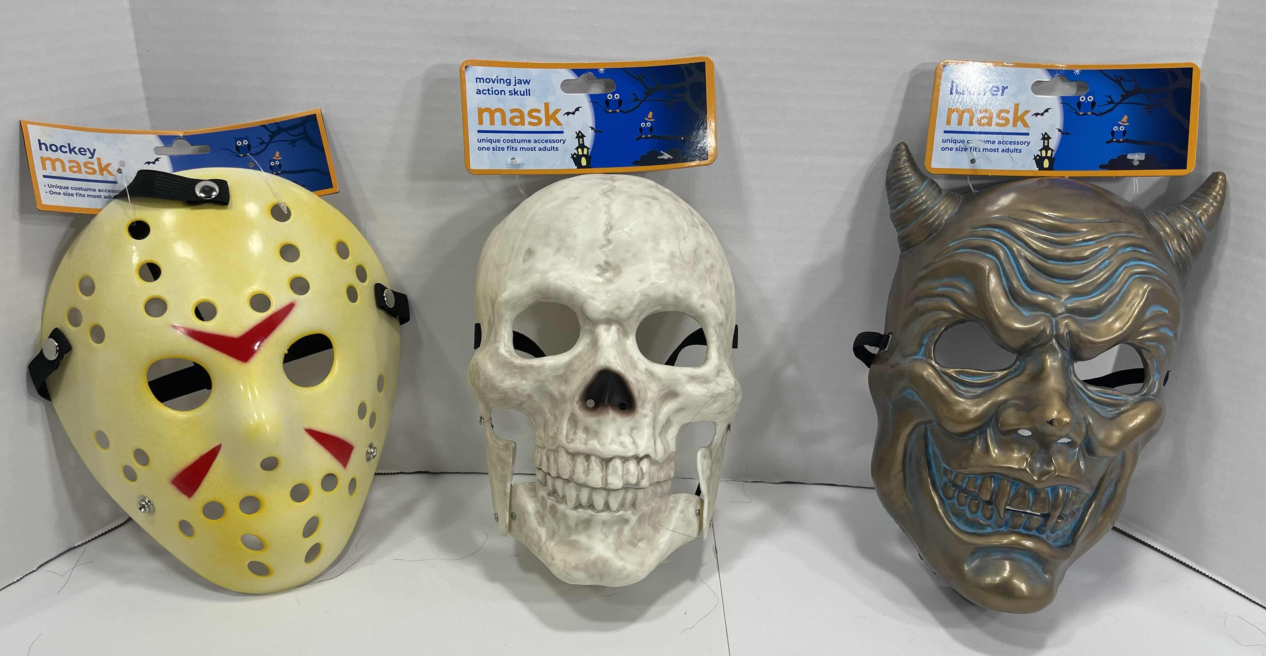 Photo 1 of ADULT ONE SIZE FITS MOST HALLOWEEN PLASTIC MASKS (3) TALLEST MEASURES 11” MSRP $30