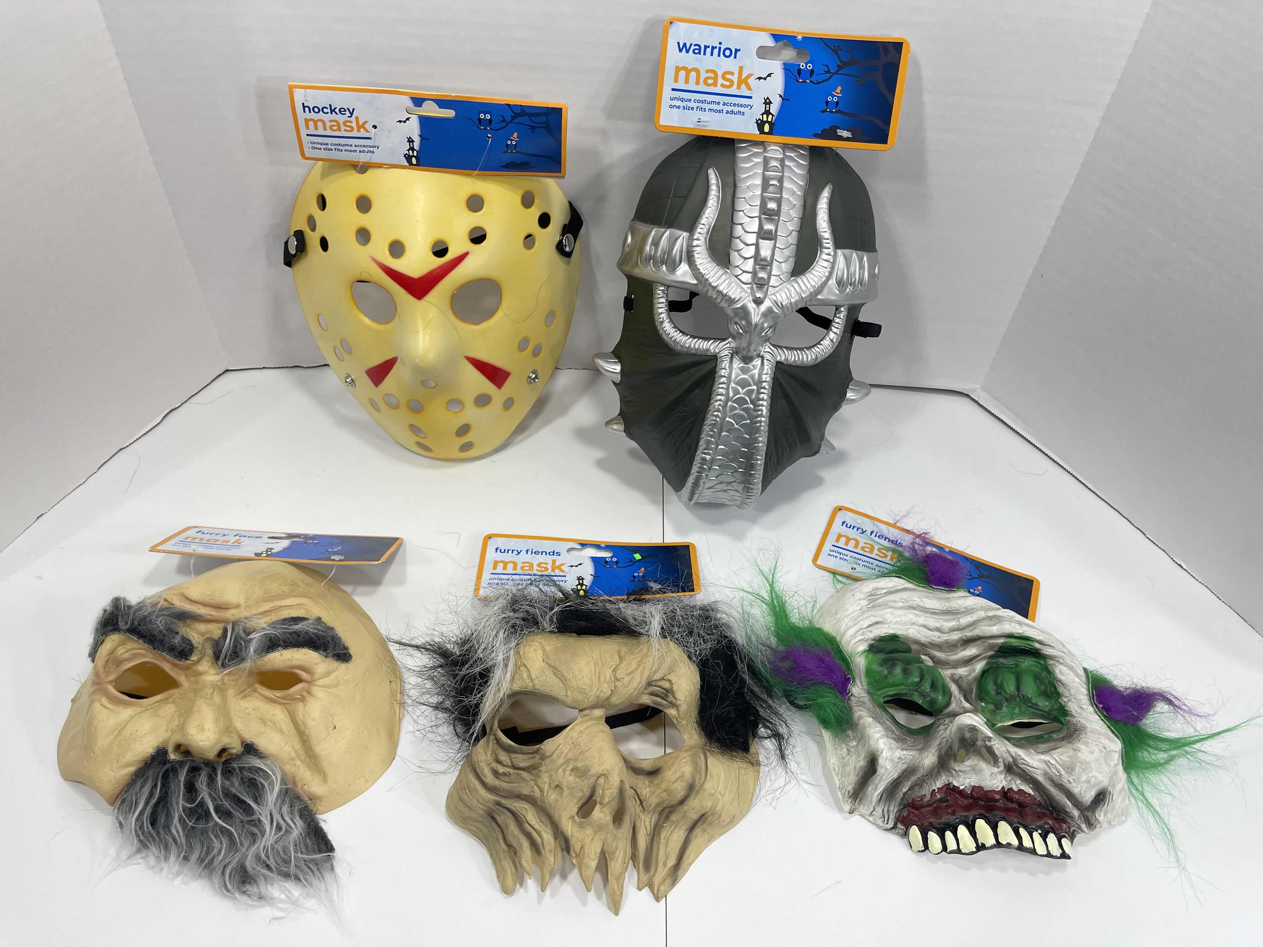 Photo 1 of ADULT ONE SIZE FITS MOST HALLOWEEN PLASTIC MASKS (2)  & FURRY FRIENDS RUBBER MASKS (3) MSRP $45