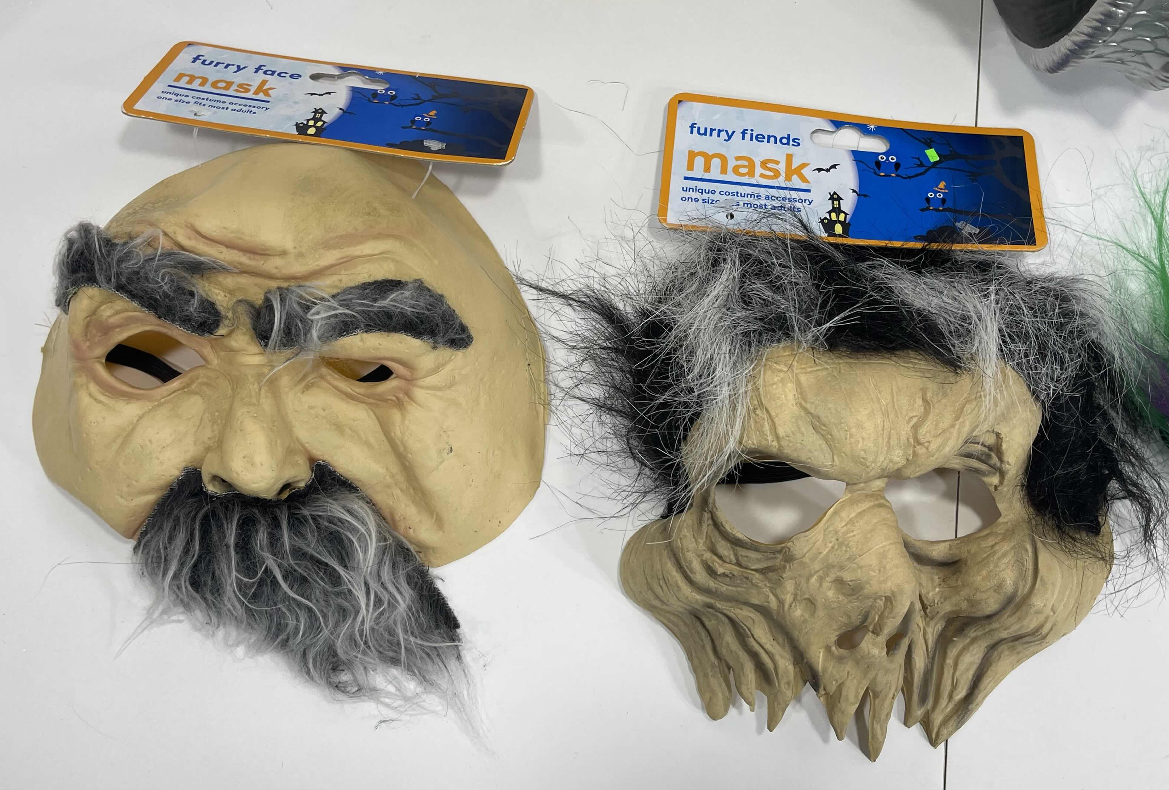 Photo 2 of ADULT ONE SIZE FITS MOST HALLOWEEN PLASTIC MASKS (2)  & FURRY FRIENDS RUBBER MASKS (3) MSRP $45