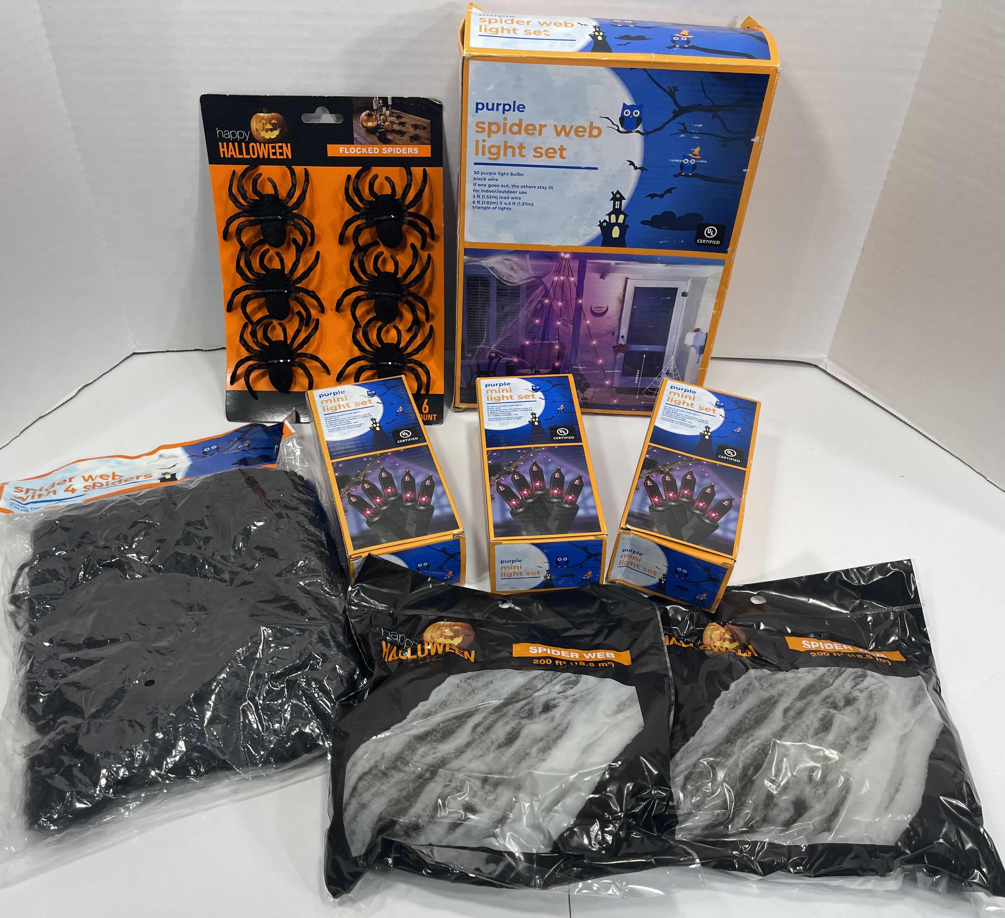 Photo 1 of SPIDER WEB PURPLE LIGHT SET, STRING LIGHTS, WEBBING & FLOCKED SPIDER SET MSRP $65