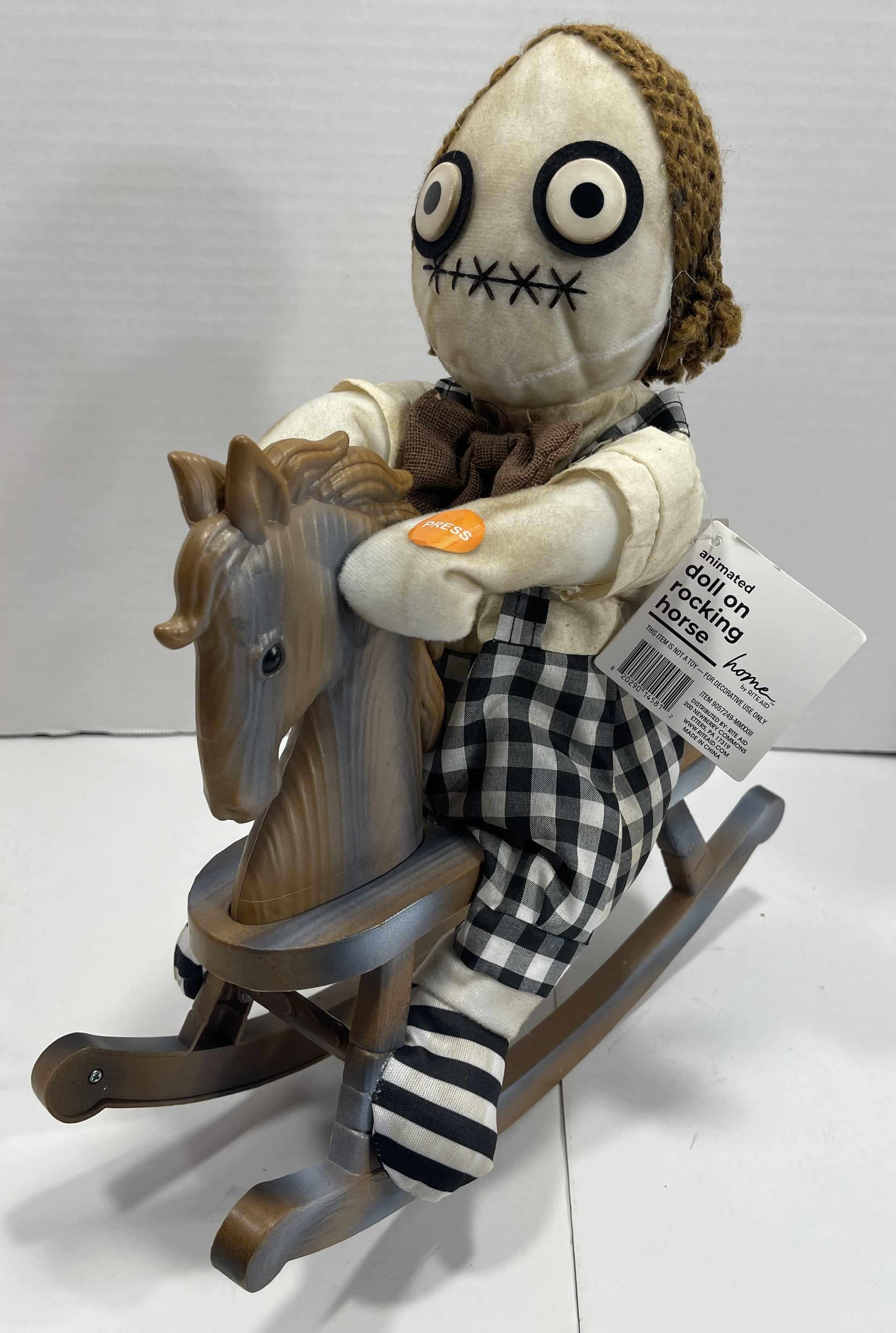 Photo 1 of ANIMATED DOLL ON ROCKING HORSE 14” SHORT HAIR - SOUND ACTIVATED LED ILLUMINATION NET MSRP $40