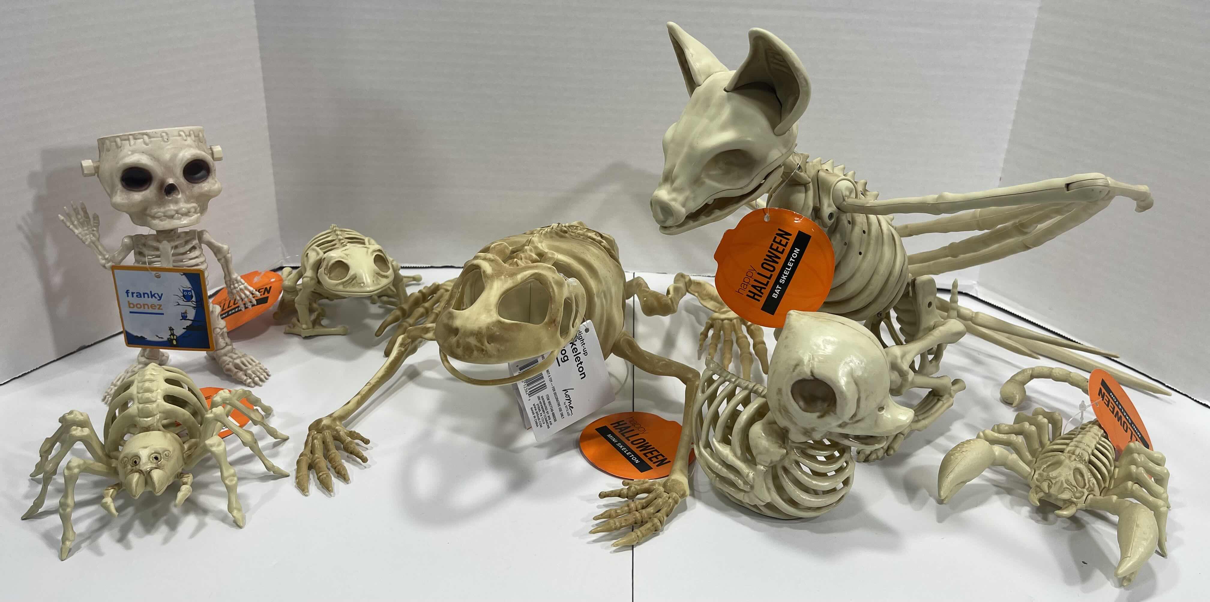 Photo 1 of HALLOWEEN FROG SKELETON LIGHT-UP, BAT SKELETON, MINI SKELETONS YARD/HOME DECORATIONS (7 ITEMS) MSRP $80