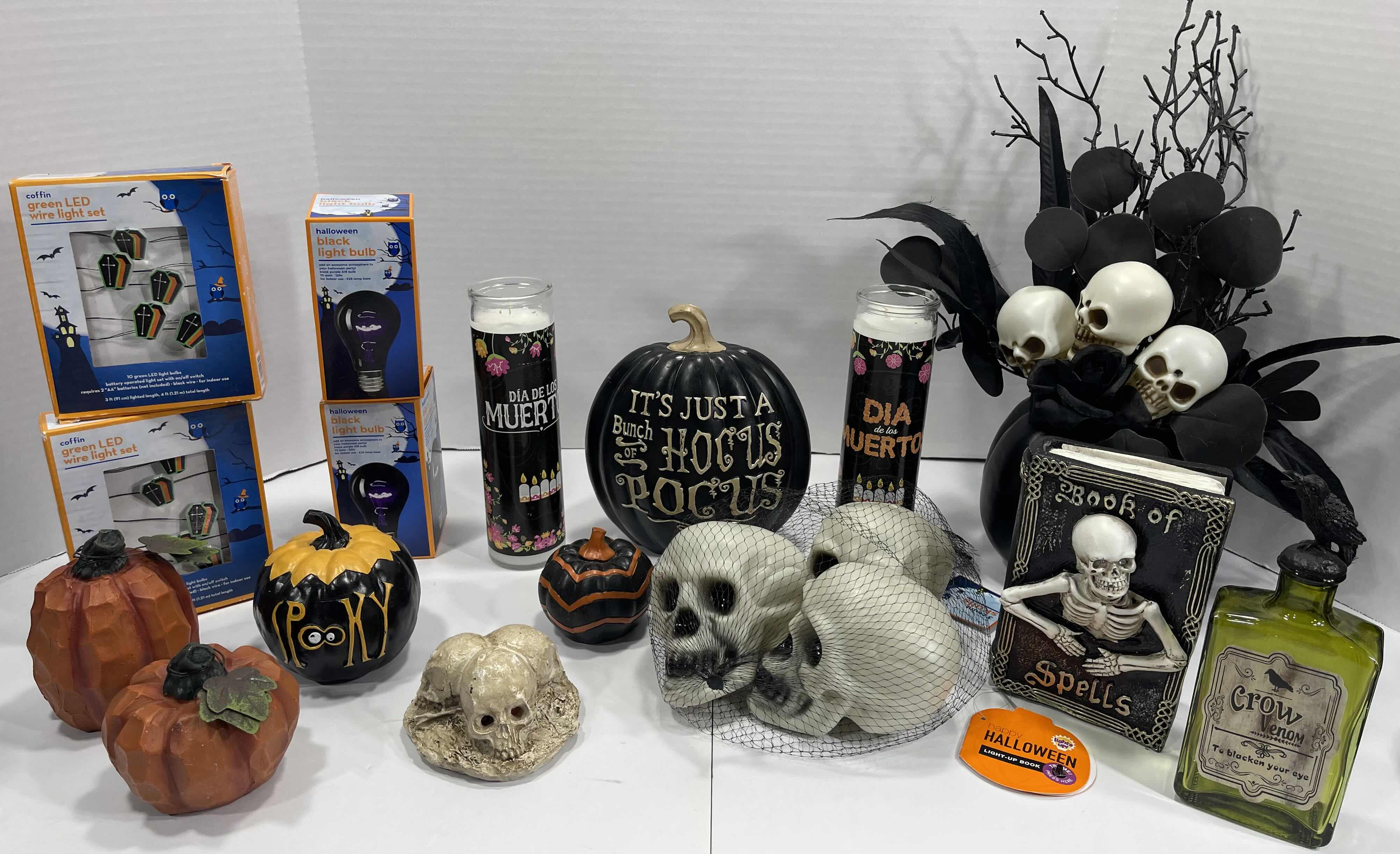 Photo 1 of HALLOWEEN TABLE TOP DECOR LARGE ASSORTMENT, CANDLES, BLACK LIGHT BULBS & LED COFFIN WIRE SETS MSRP $60