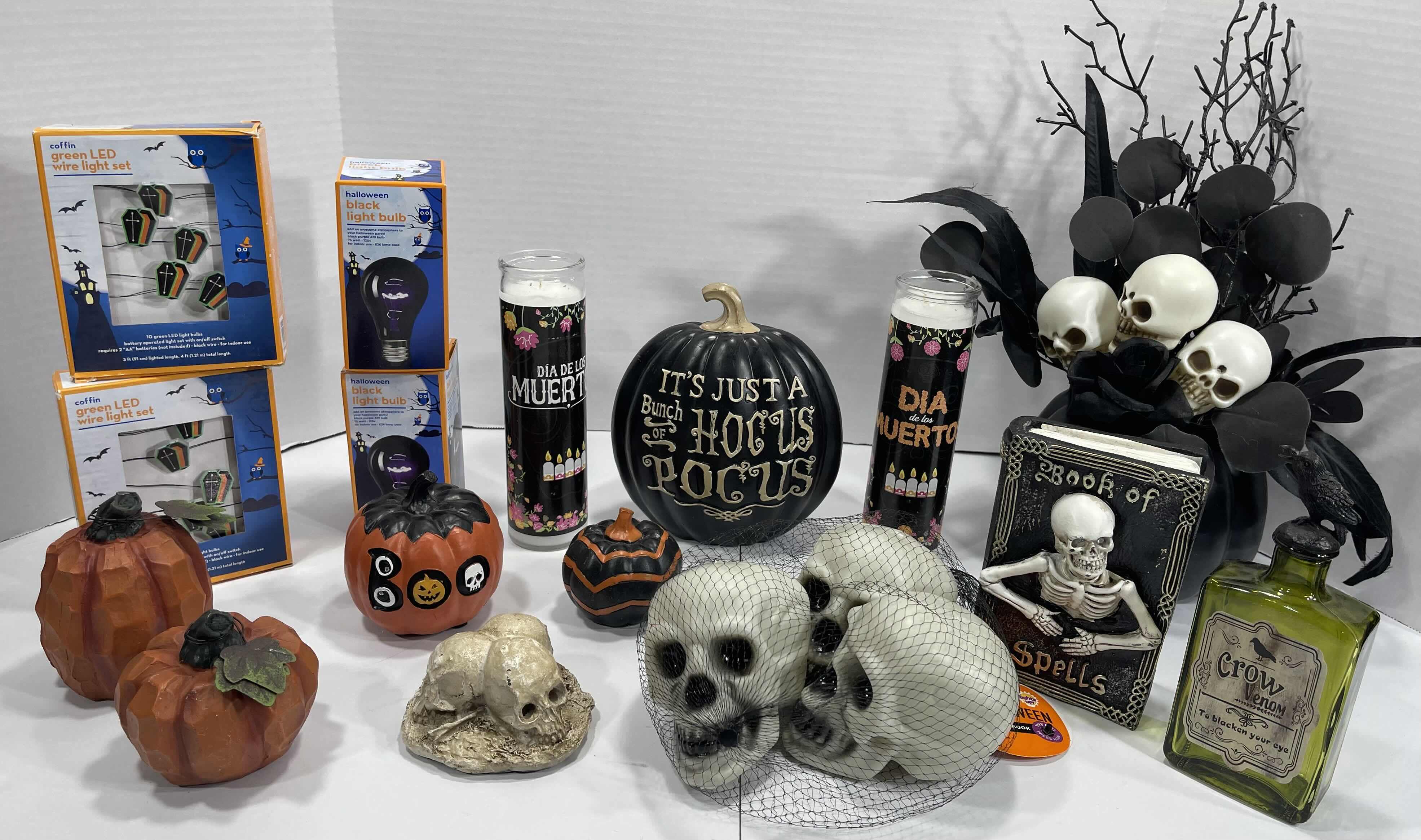 Photo 1 of HALLOWEEN TABLE TOP DECOR LARGE ASSORTMENT, CANDLES, BLACK LIGHT BULBS & LED COFFIN WIRE SETS MSRP $60