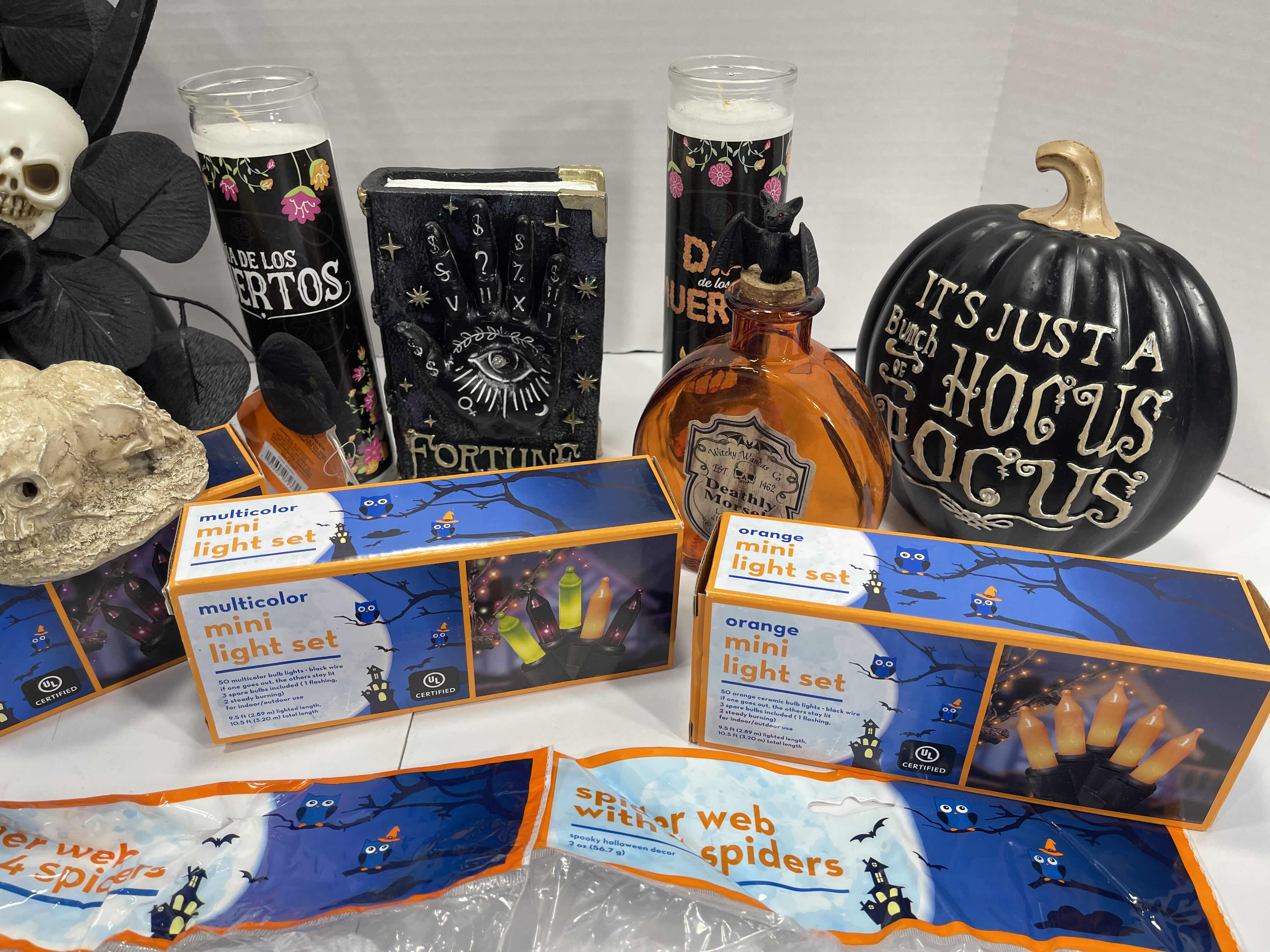 Photo 3 of HALLOWEEN HOME TABLE TOP DECOR (14 ITEMS) -  SPIDER WEBS, LIGHT SETS, CANDLES, RESIN DECOR ETC MSRP $100