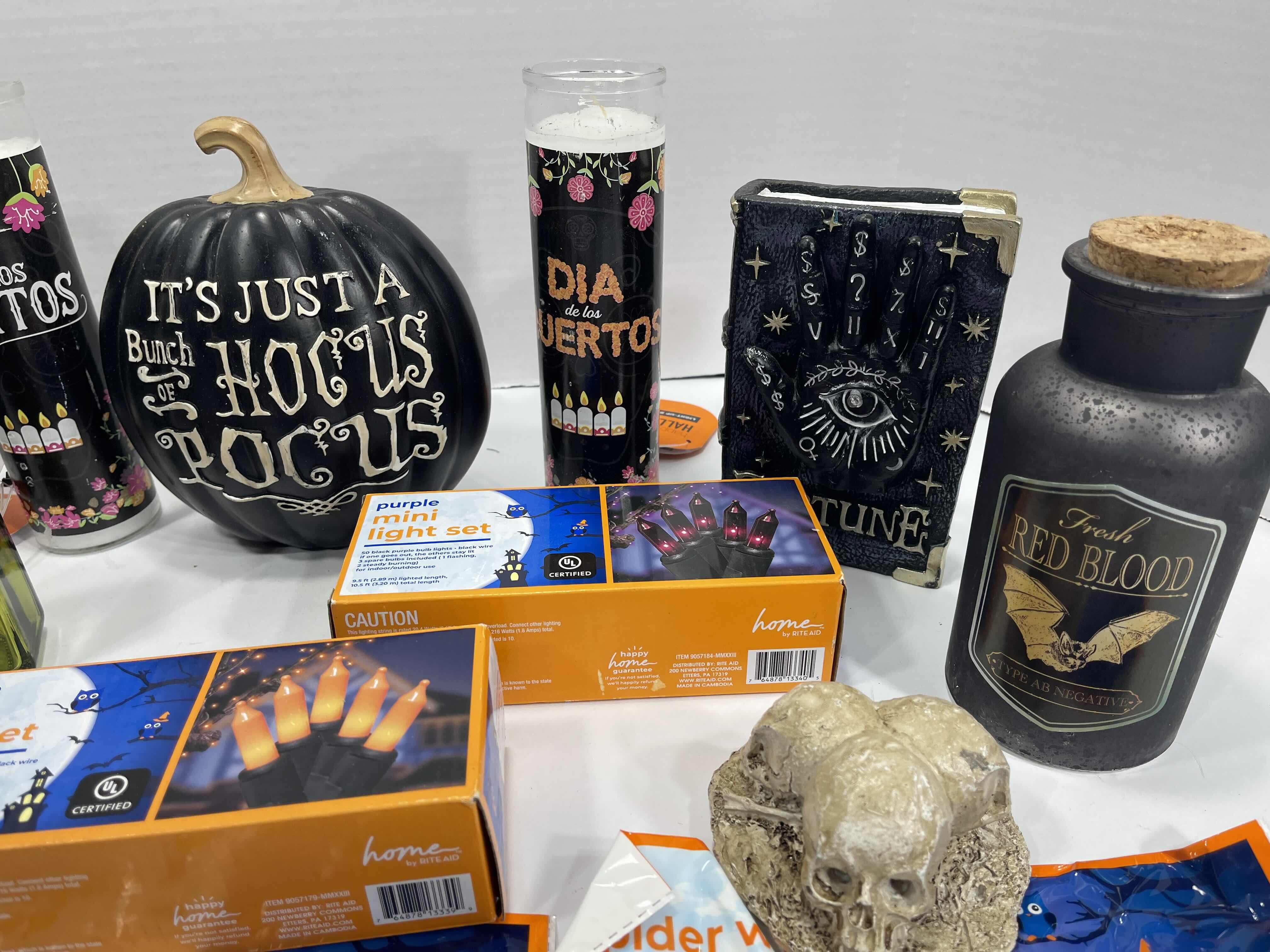 Photo 3 of HALLOWEEN HOME TABLE TOP DECOR (14 ITEMS) -  SPIDER WEBS, LIGHT SETS, CANDLES, RESIN DECOR ETC MSRP $100