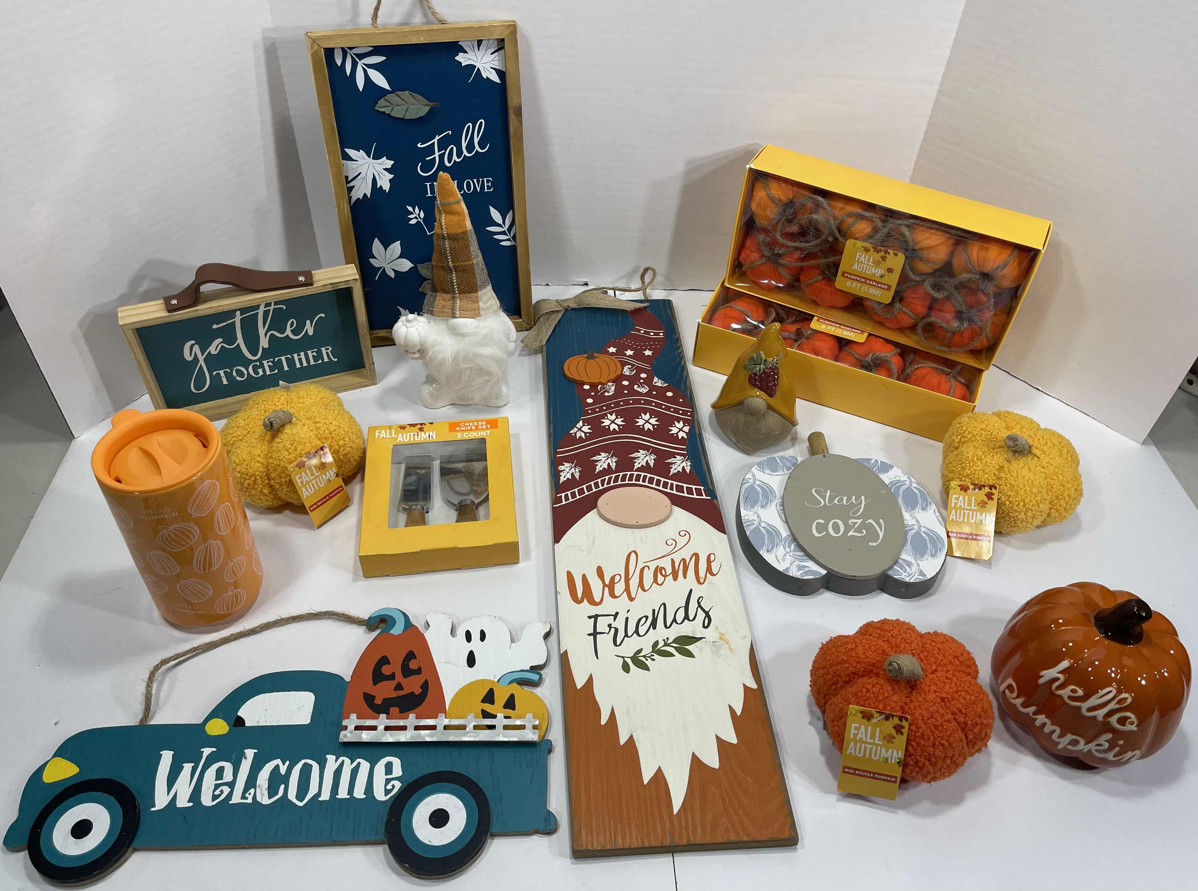 Photo 1 of FALL AUTUMN HOME DECOR (15 ITEMS) - WOOD SIGNS, GARLAND SETS, MINI BOUCLE PUMPKINS, CHEESE KNIFE SET & CERAMIC GNOMES, TRAVEL CUP AND PUMPKIN MSRP $100