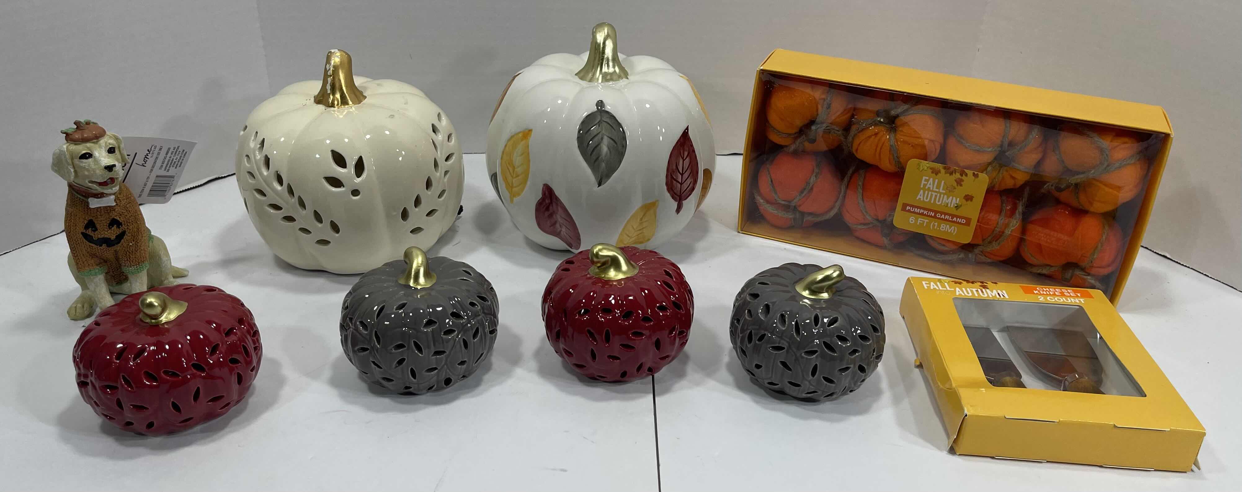 Photo 1 of HOLIDAY CERAMIC PUMPKINS (6) TALLEST 6.5”, HALLOWEEN DOG DECOR H5.5” & AUTUMN FALL HOME DECOR - PUMPKIN GARLAND AND CHEESE KNIFE SET MSRP $80