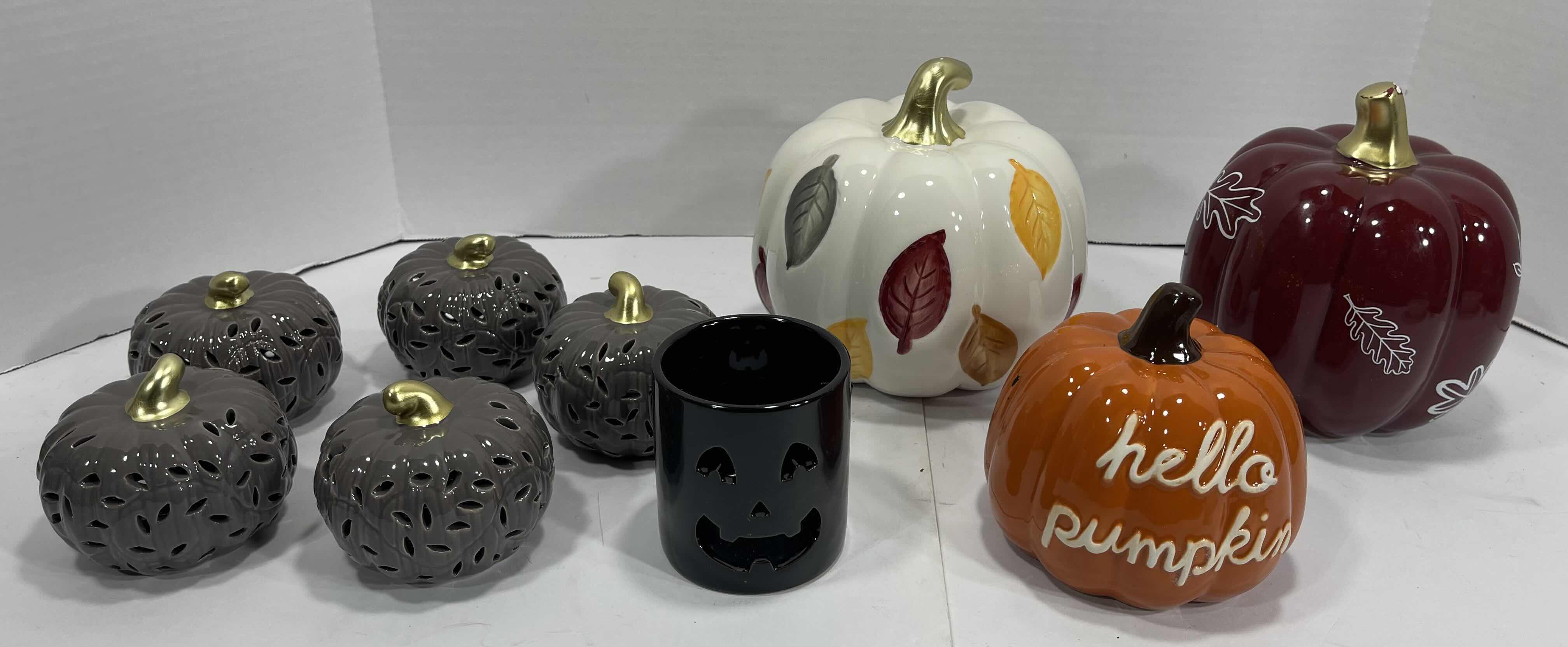 Photo 1 of AUTUMN HOLIDAY CERAMIC PUMPKINS (8) TALLEST 6.5” & BLACK CERAMIC TEA LIGHT HOLDER MSRP $85