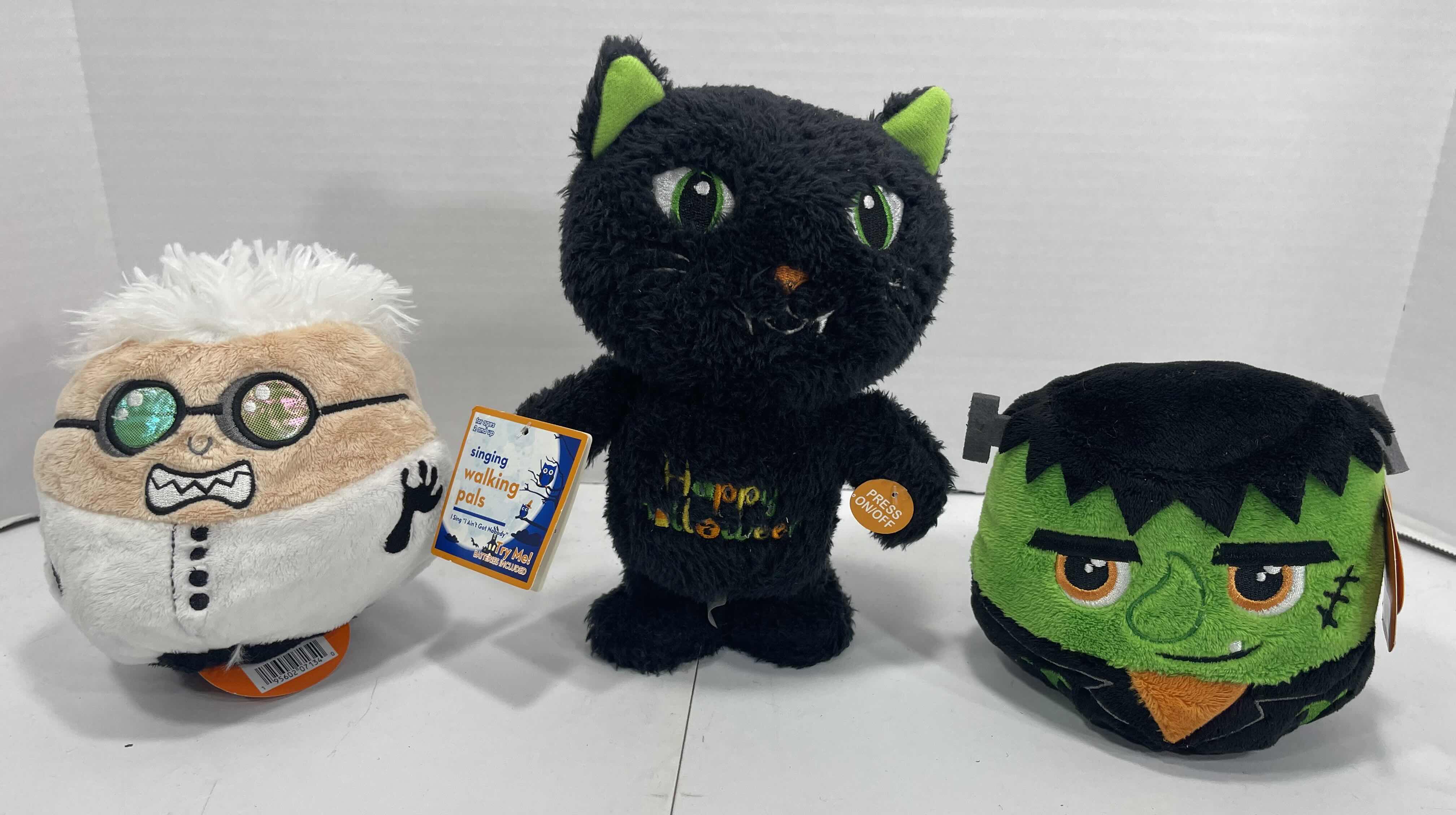 Photo 1 of HALLOWEEN SINGING WALKING PLUSH H8.5” & FRANKENSTEIN/SCIENTIST REVERSIBLE PLUSH H5” (2) MSRP $40