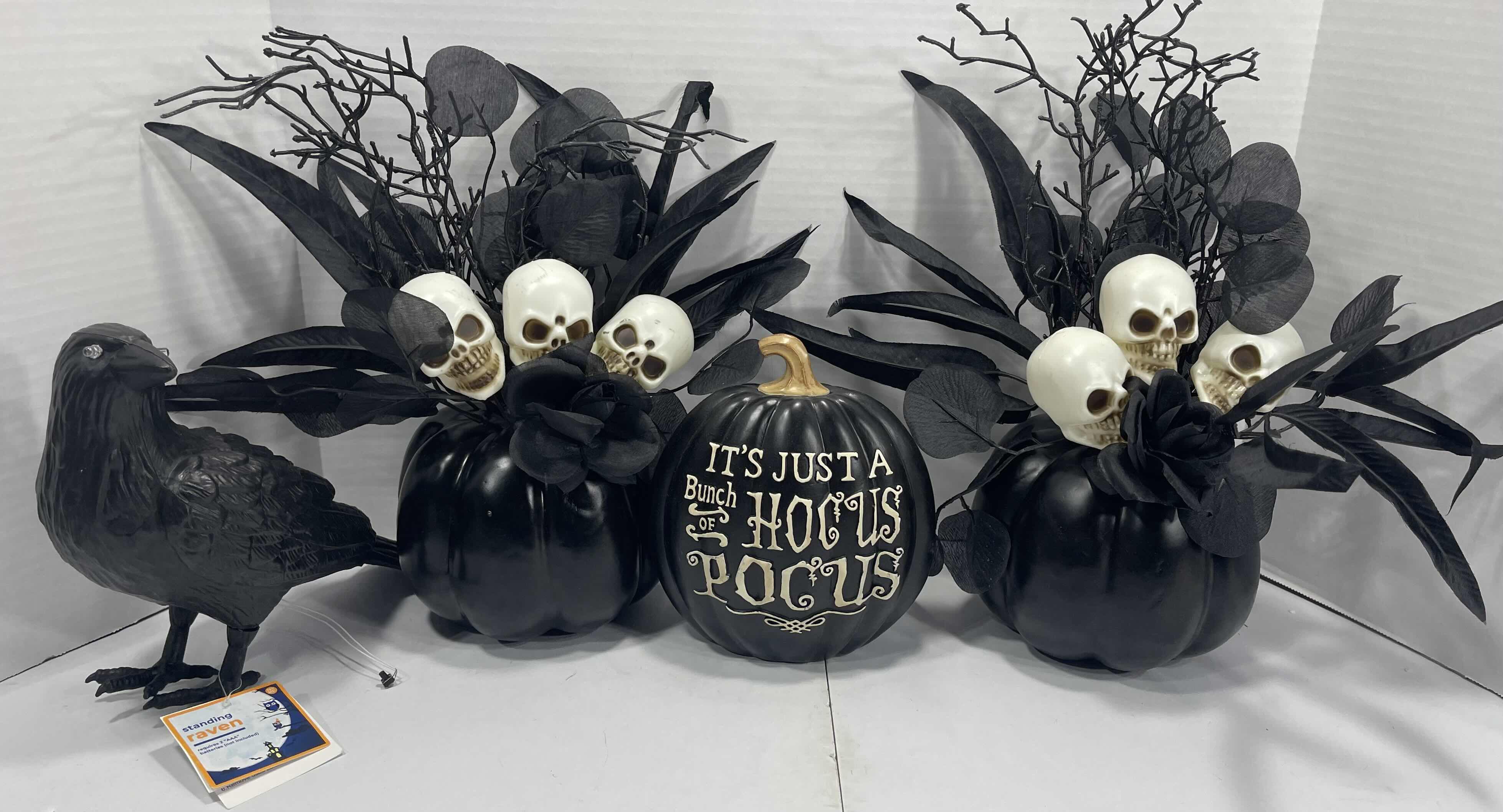 Photo 1 of HALLOWEEN TABLE TOP DECOR (4 ITEMS) BLACK PUMPKIN SKULL FLOWER ARRANGEMENT (2), IT’S ALL JUST HOCUS POCUS PUMPKIN & LIGHT-UP EYES RAVEN