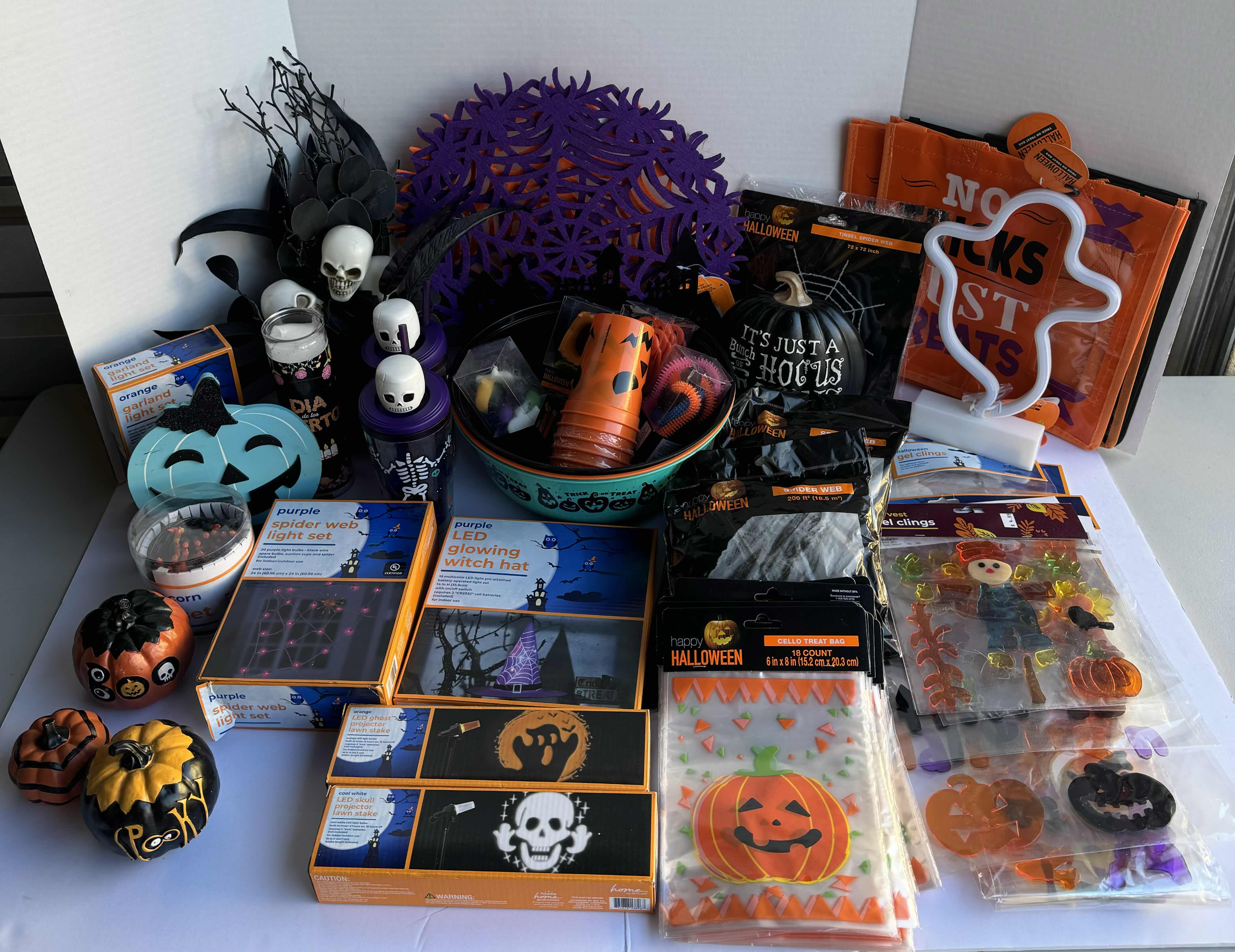 Photo 1 of HALLOWEEN TABLE TOP DECOR LARGE ASSORTMENT - CANDY BOWLS, LIGHT SETS, GLOW STICKS, HALLOWEEN CUPS, WOOD DISPLAYS, RESIN PUMPKINS AND MORE MSRP $70