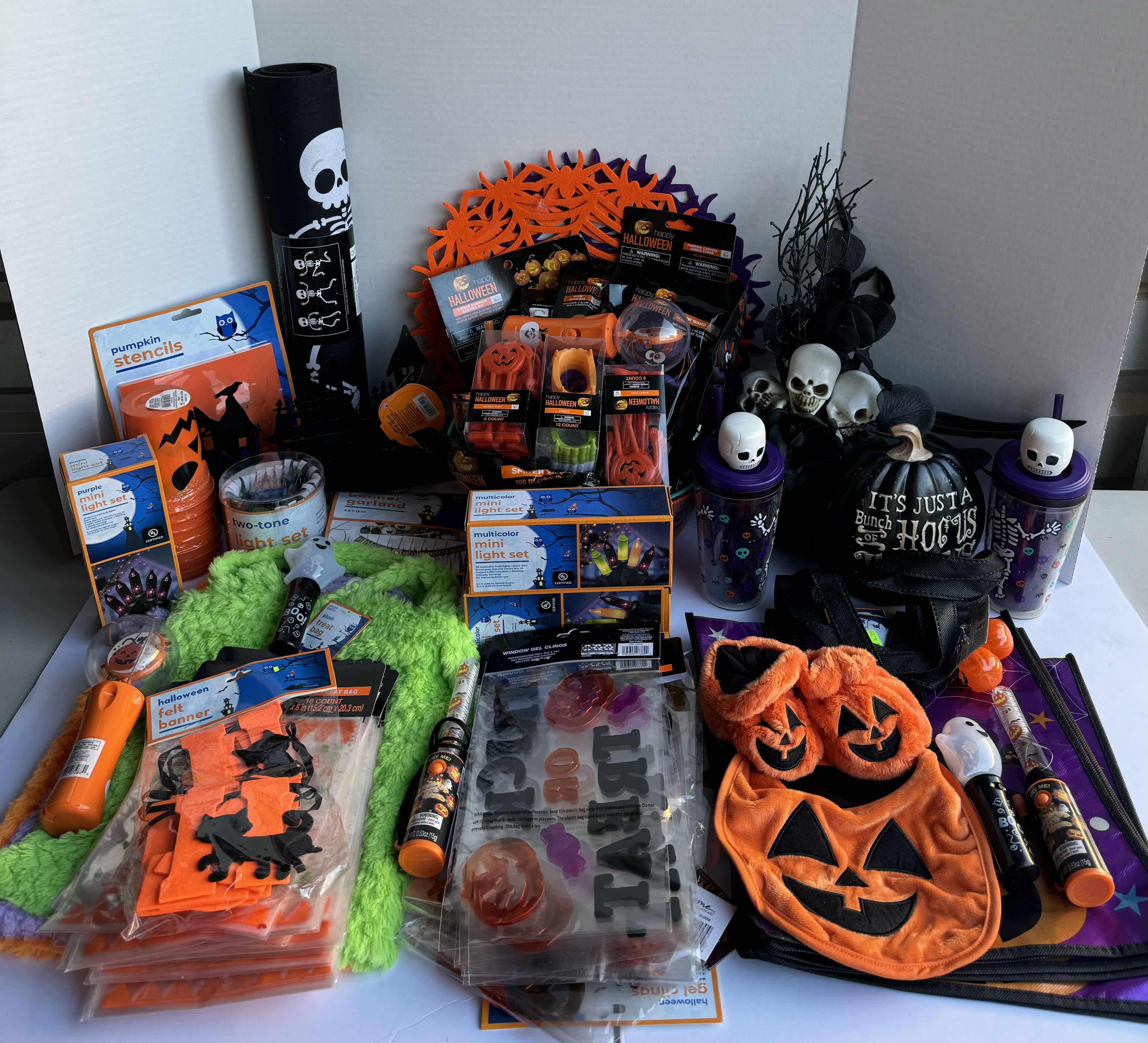 Photo 1 of HALLOWEEN TABLE TOP DECOR LARGE ASSORTMENT - CANDY BOWLS, LIGHT SETS, GLOW STICKS, HALLOWEEN CUPS, MATTS, RESIN PUMPKINS AND MORE MSRP $70