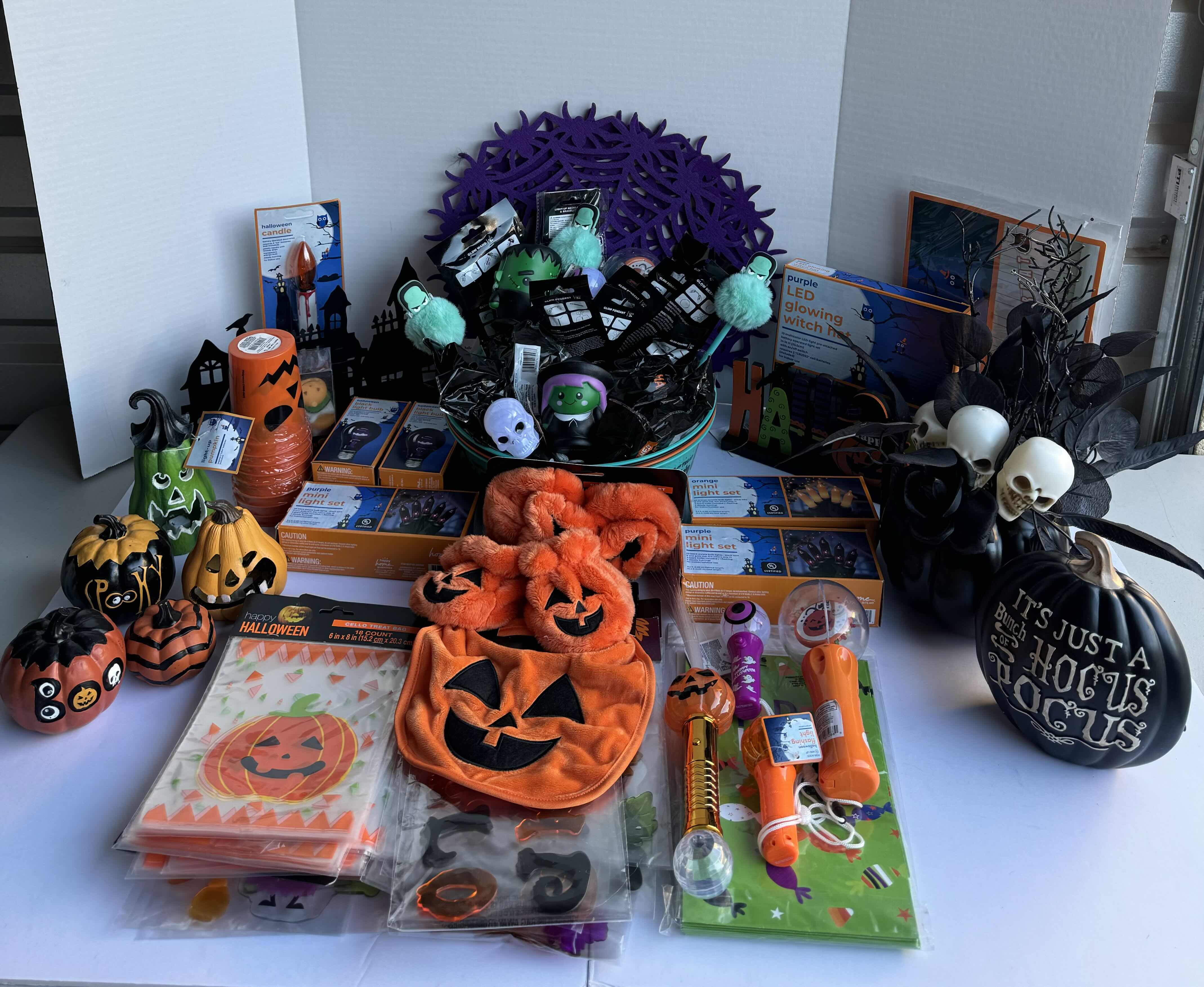 Photo 1 of HALLOWEEN TABLE TOP DECOR LARGE ASSORTMENT - CANDY BOWLS, LIGHT SETS, GLOW STICKS, HALLOWEEN CUPS, WOOD DISPLAYS, RESIN PUMPKINS, TOYS AND MORE MSRP $70