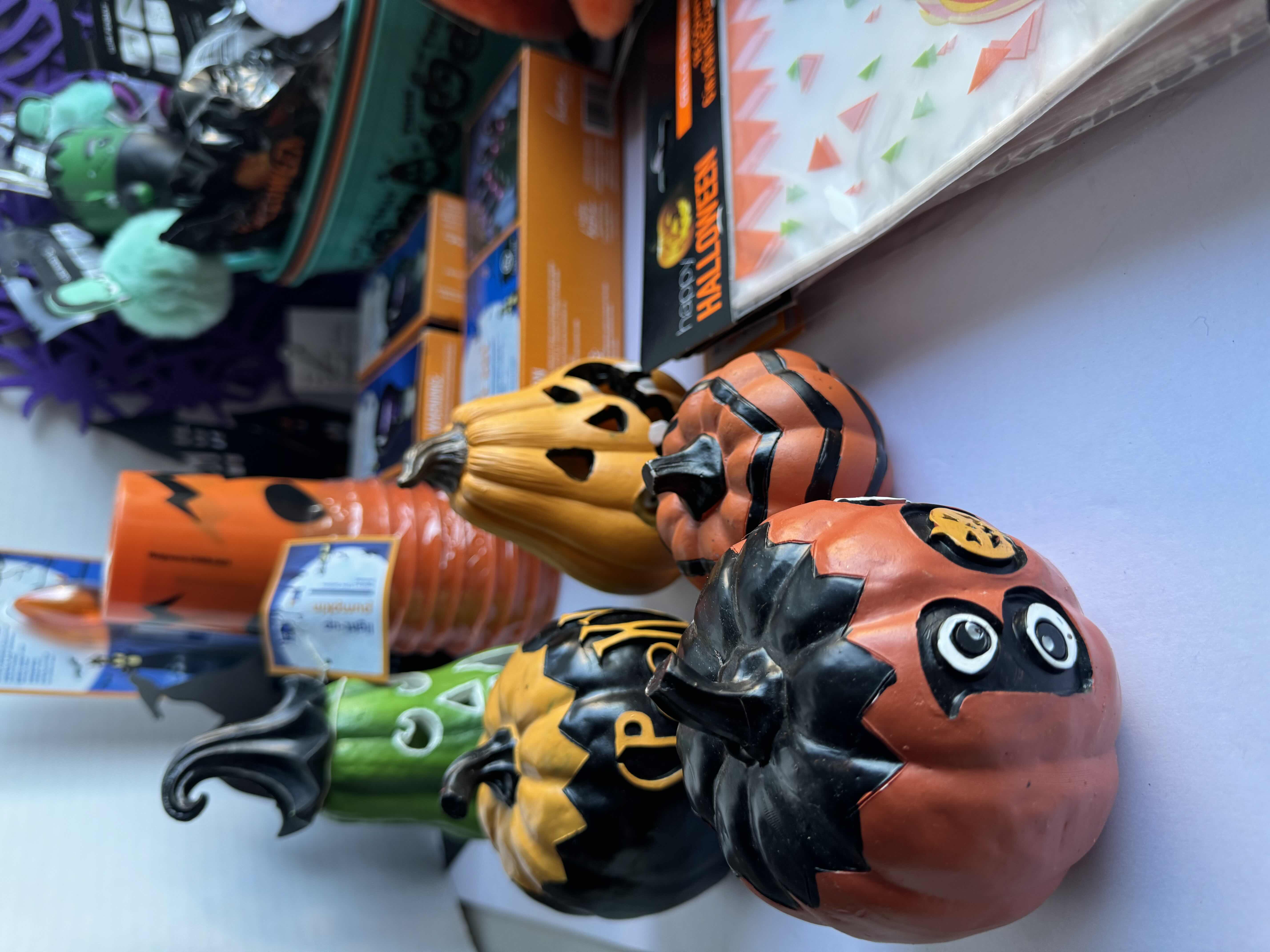 Photo 2 of HALLOWEEN TABLE TOP DECOR LARGE ASSORTMENT - CANDY BOWLS, LIGHT SETS, GLOW STICKS, HALLOWEEN CUPS, WOOD DISPLAYS, RESIN PUMPKINS, TOYS AND MORE MSRP $70