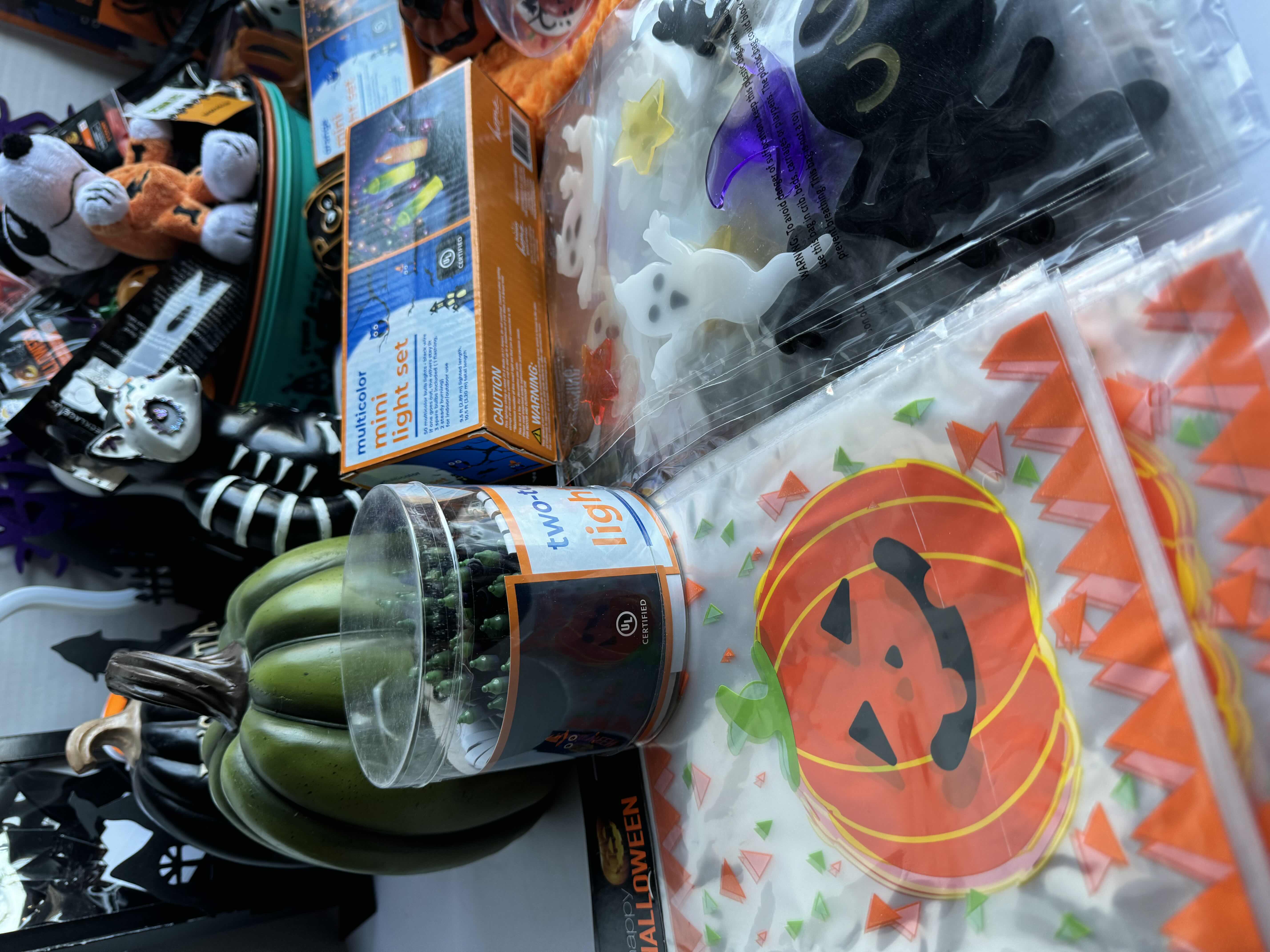 Photo 2 of HALLOWEEN TABLE TOP DECOR LARGE ASSORTMENT - CANDY BOWLS, LIGHT SETS, GLOW STICKS, HALLOWEEN CUPS, WOOD DISPLAYS, RESIN PUMPKINS, TOYS AND MORE MSRP $70