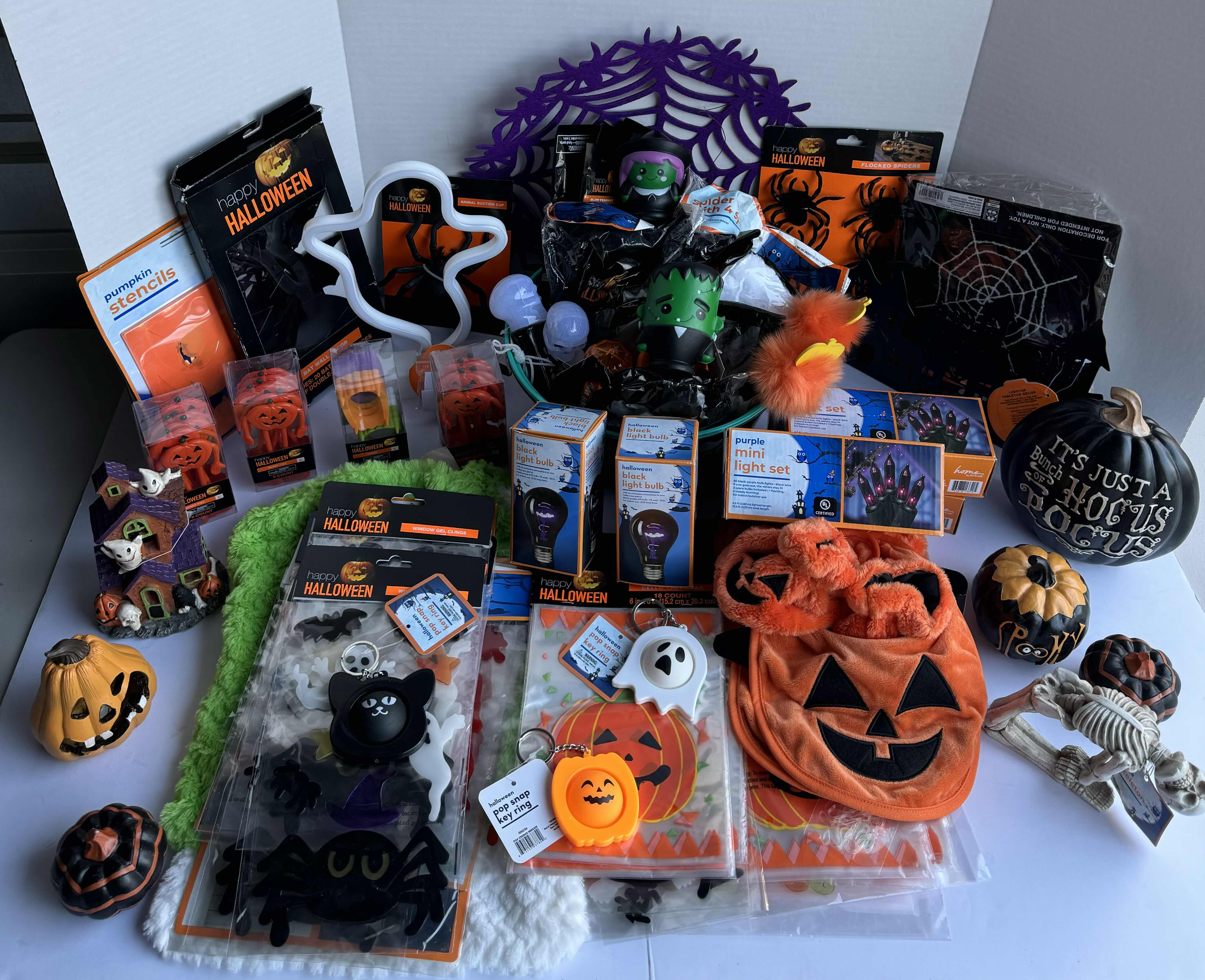 Photo 1 of HALLOWEEN TABLE TOP DECOR LARGE ASSORTMENT - CANDY BOWLS, LIGHT SETS, GLOW STICKS, HALLOWEEN CUPS, WOOD DISPLAYS, RESIN PUMPKINS, TOYS AND MORE MSRP $70