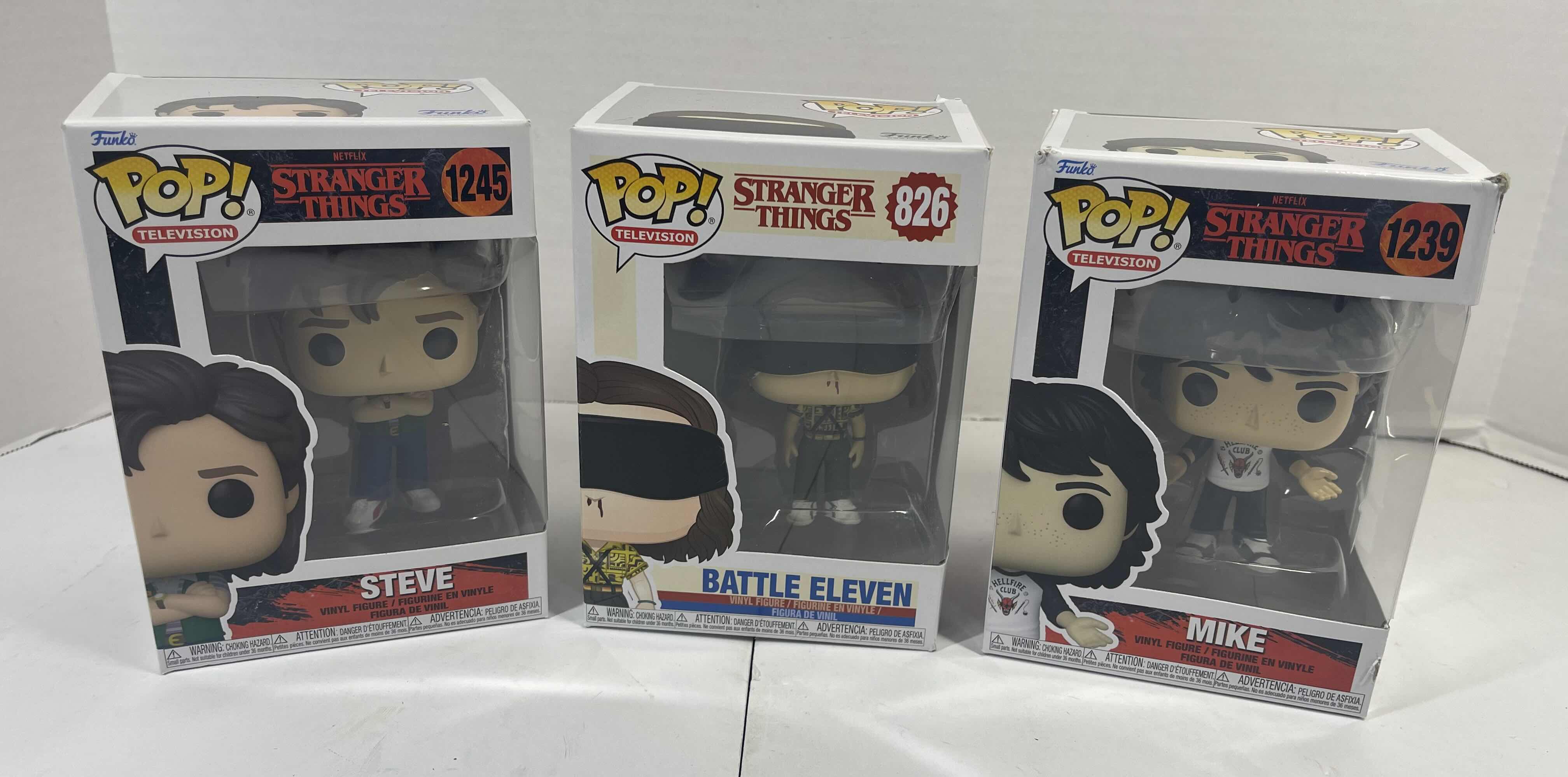 Photo 1 of FUNKO POPS NETFLIX STRANGER THINGS (3) - STEVE #1245, BATTLE ELEVEN #826 & MIKE #1239 MSRP $50