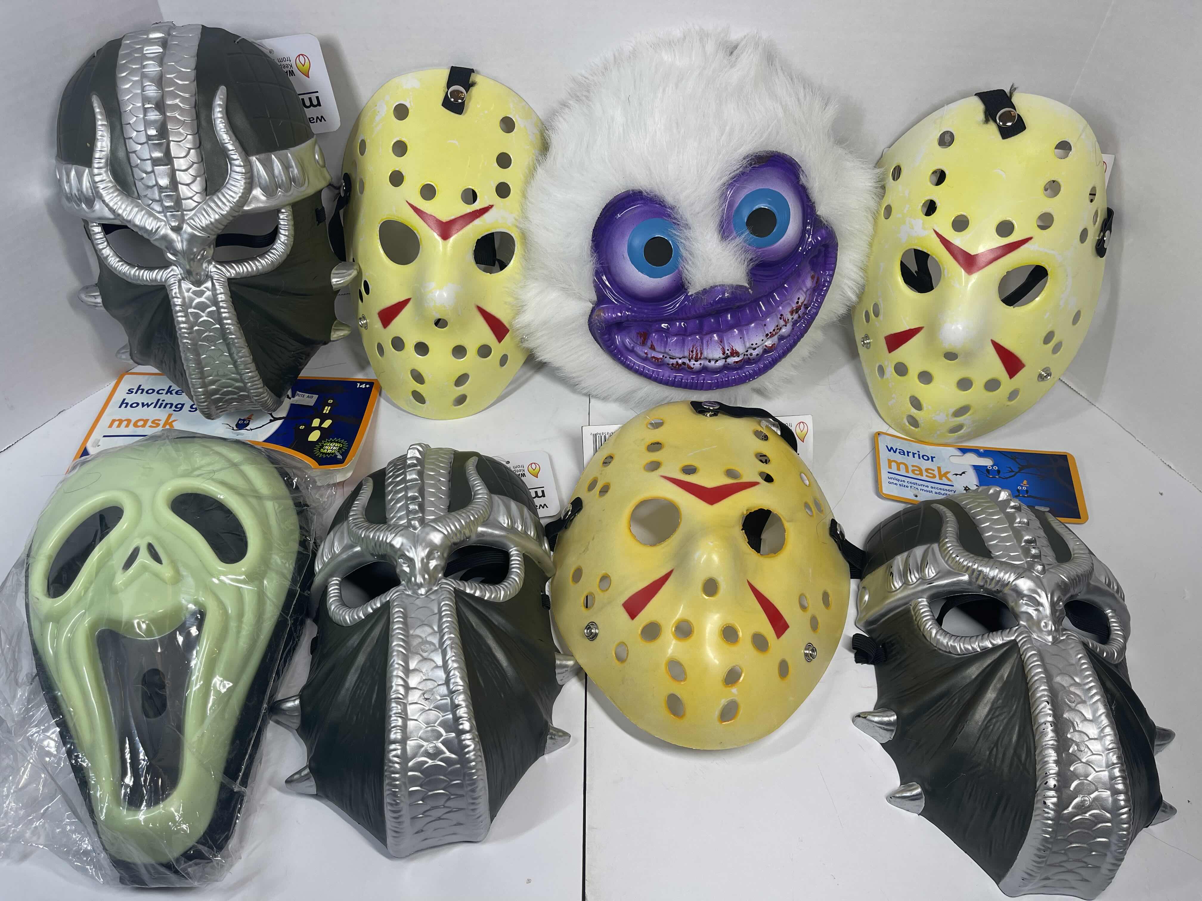 Photo 1 of HALLOWEEN PLASTIC MASKS (8) ONE SIZE FITS MOST ADULTS