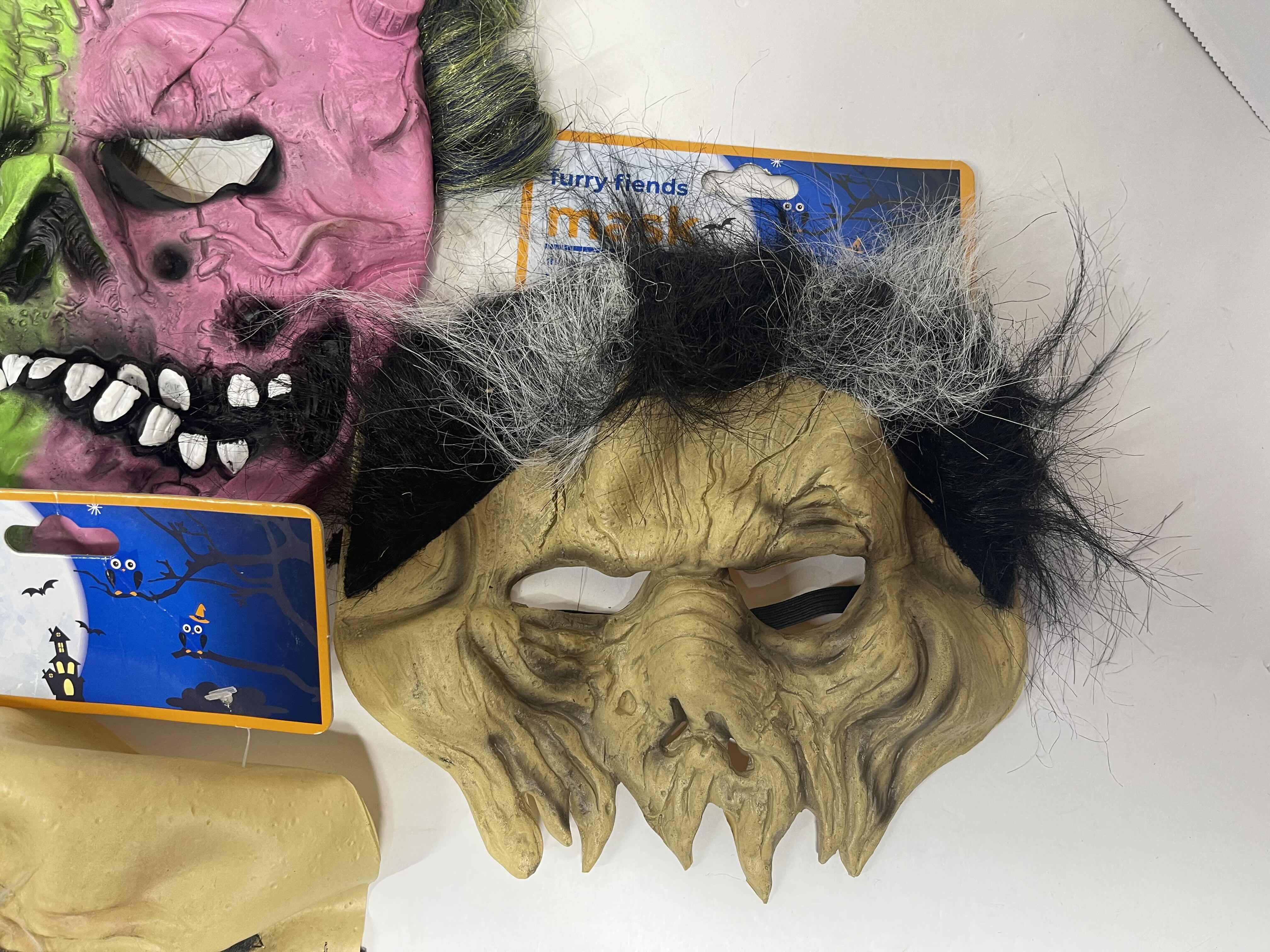 Photo 4 of HALLOWEEN RUBBER MASKS WITH HAIR (5) ONE SIZE FITS MOST ADULTS MSRP $65