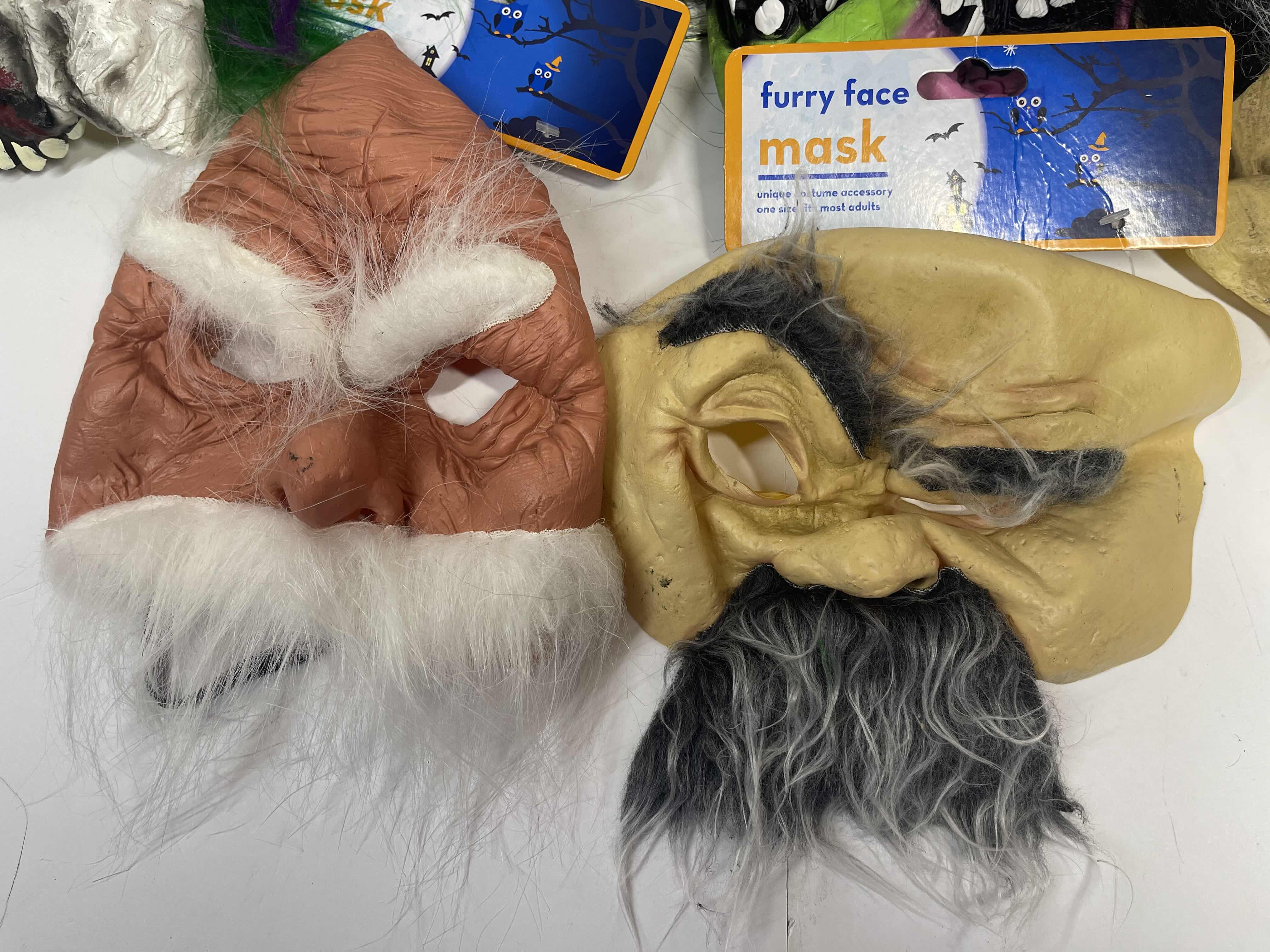 Photo 3 of HALLOWEEN RUBBER MASKS WITH HAIR (5) ONE SIZE FITS MOST ADULTS MSRP $65