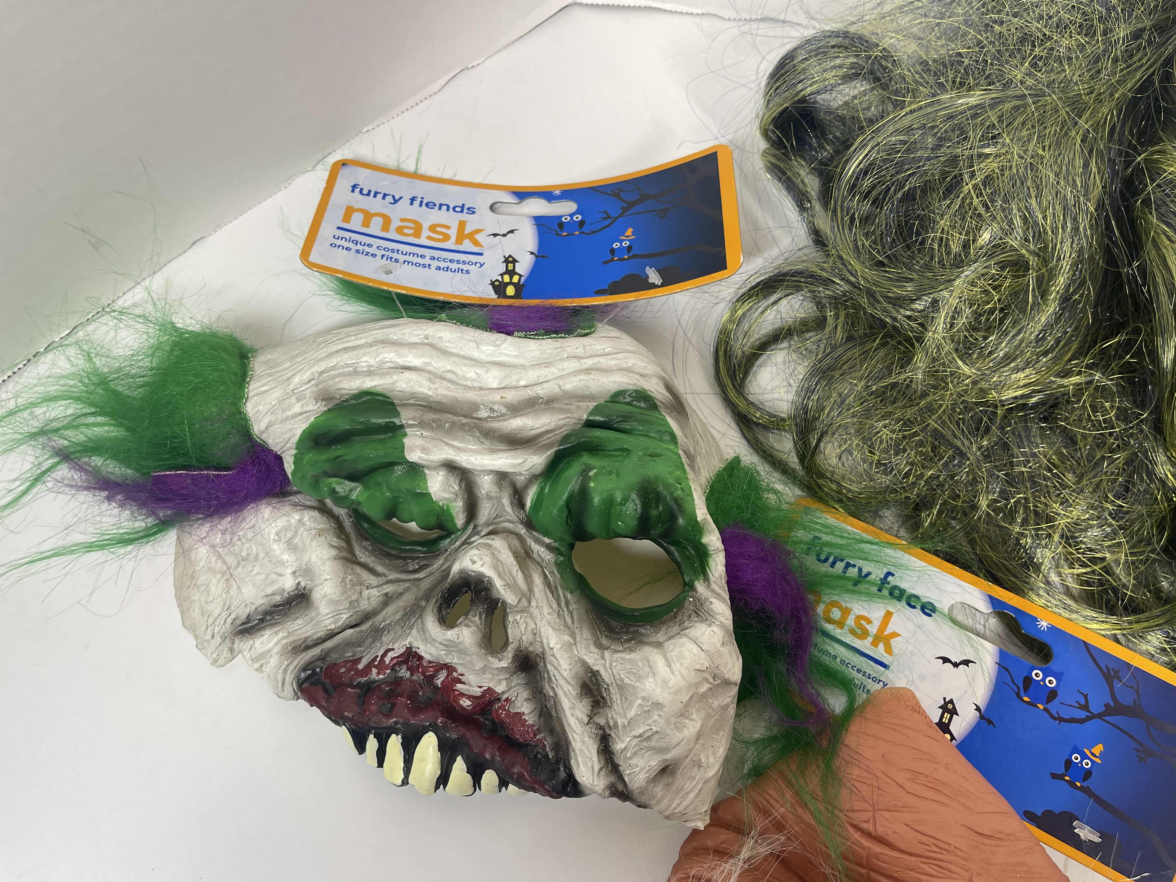 Photo 2 of HALLOWEEN RUBBER MASKS WITH HAIR (5) ONE SIZE FITS MOST ADULTS MSRP $65